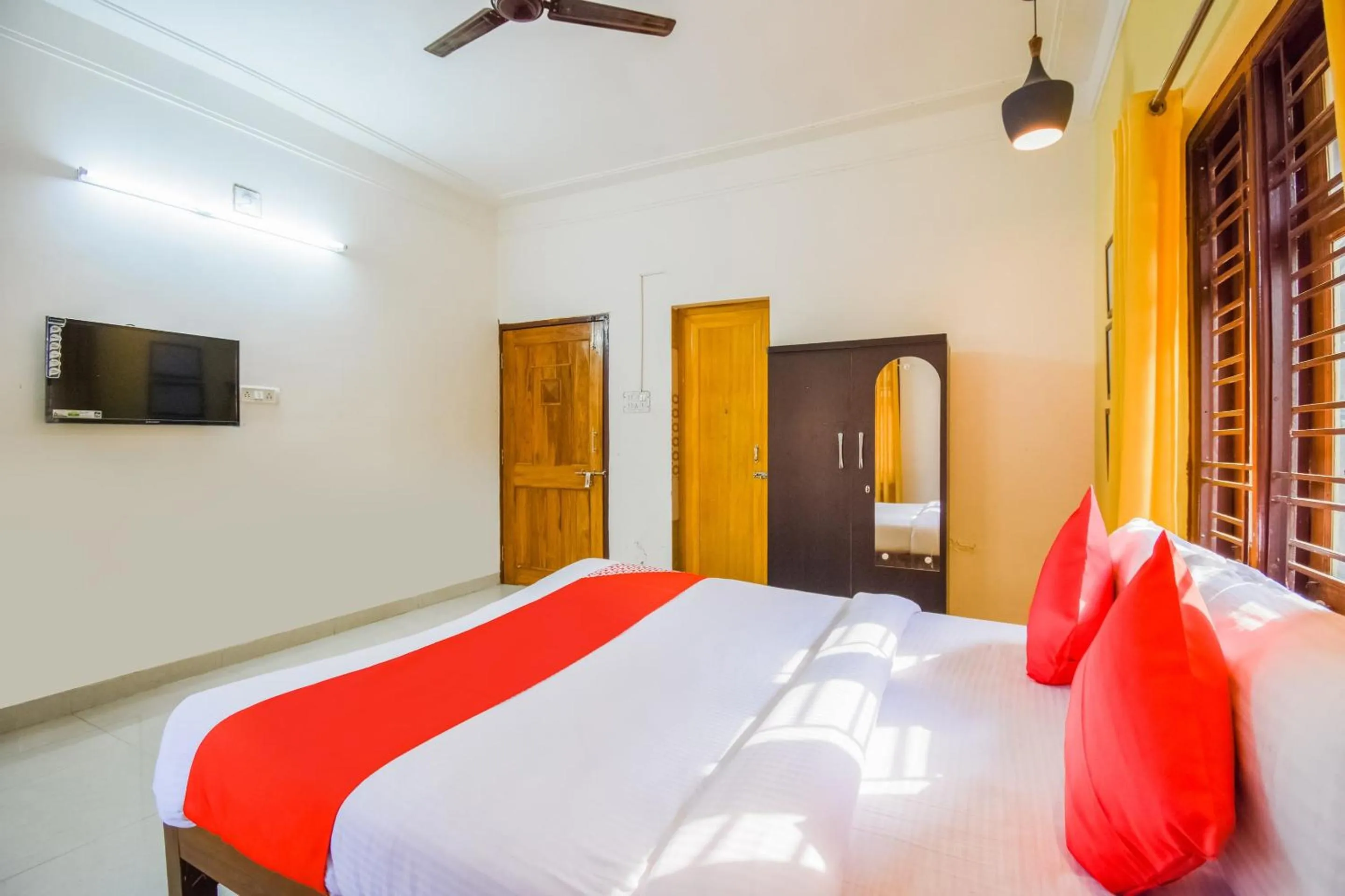 Bedroom in Hotel O Mks Inn