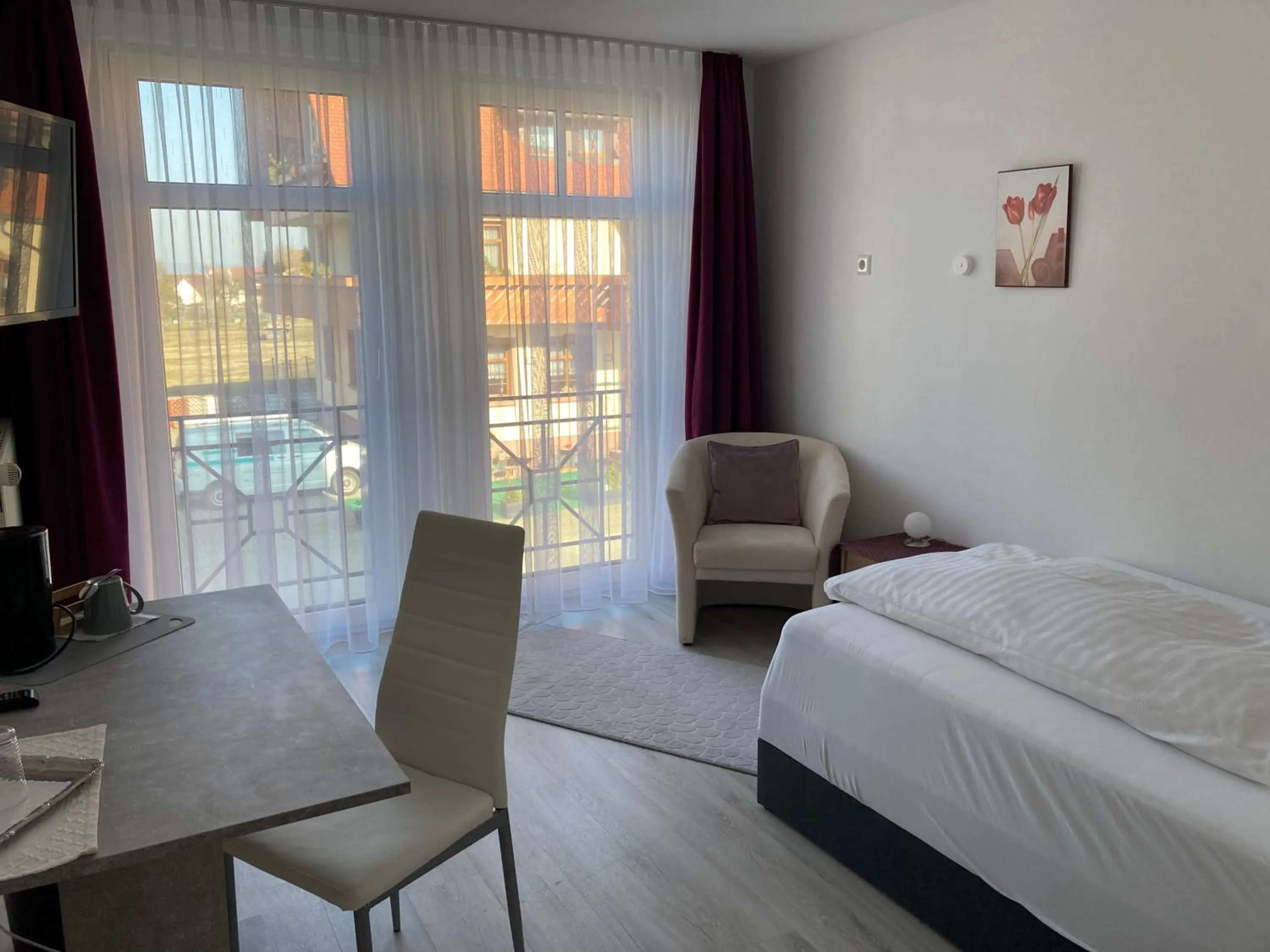 Seating area, Bed in Hotel Landgasthof Kranz