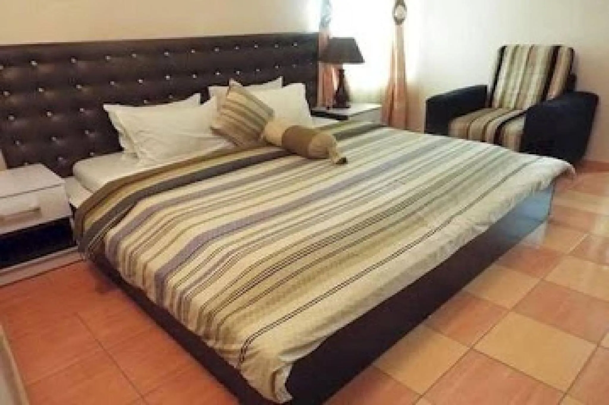 Bed in Royal View Hotel and Suites - Standard