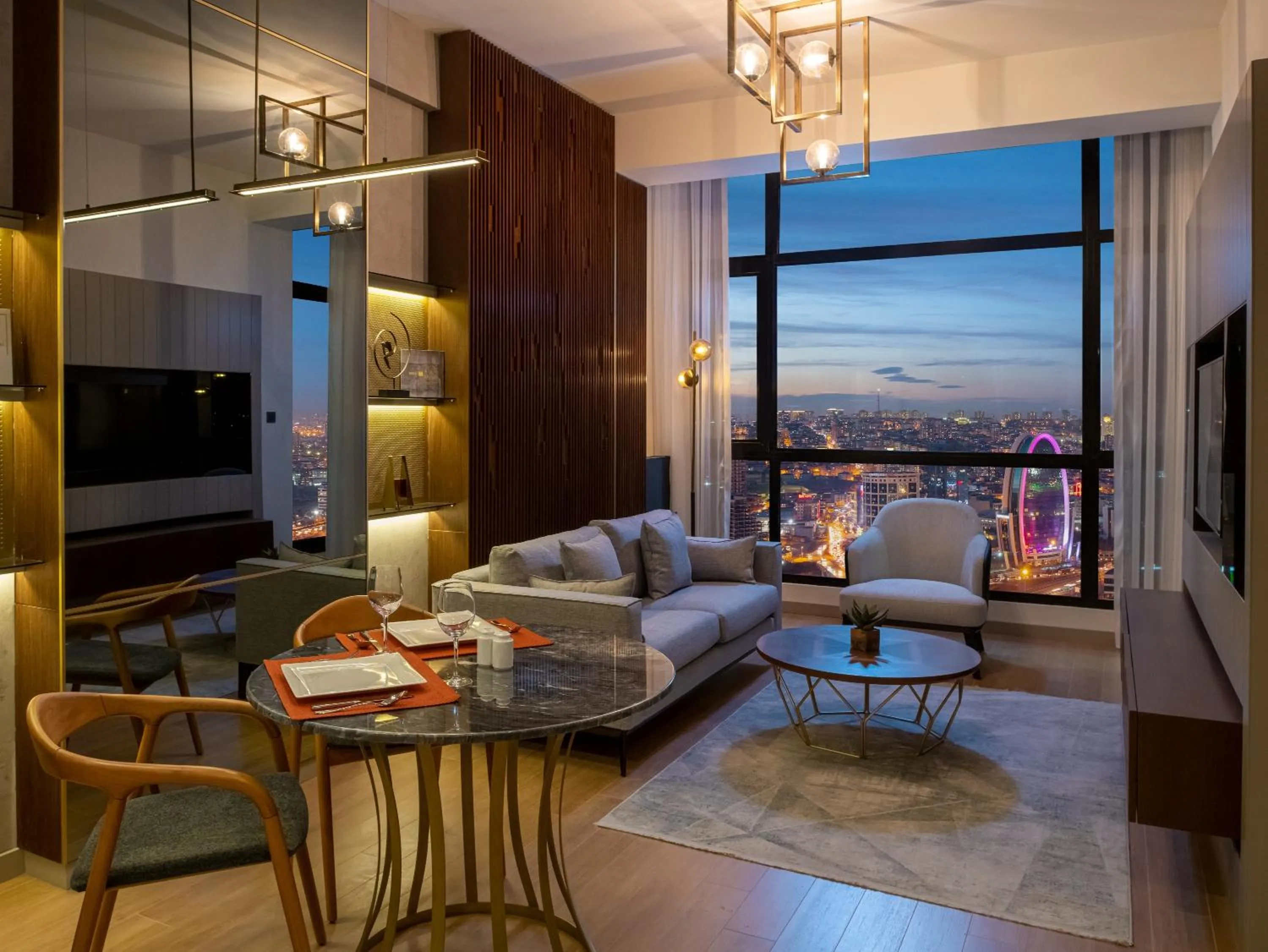 Communal lounge/ TV room in G Tower Furnished Apartment Rentals