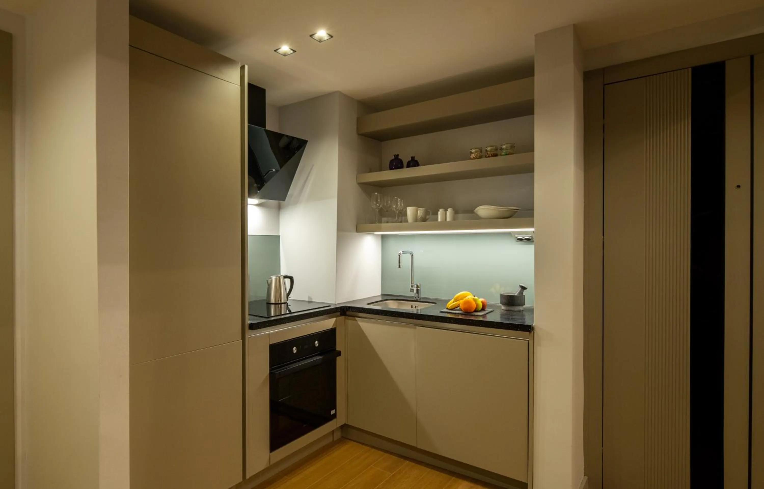 Kitchen or kitchenette in G Tower Furnished Apartment Rentals