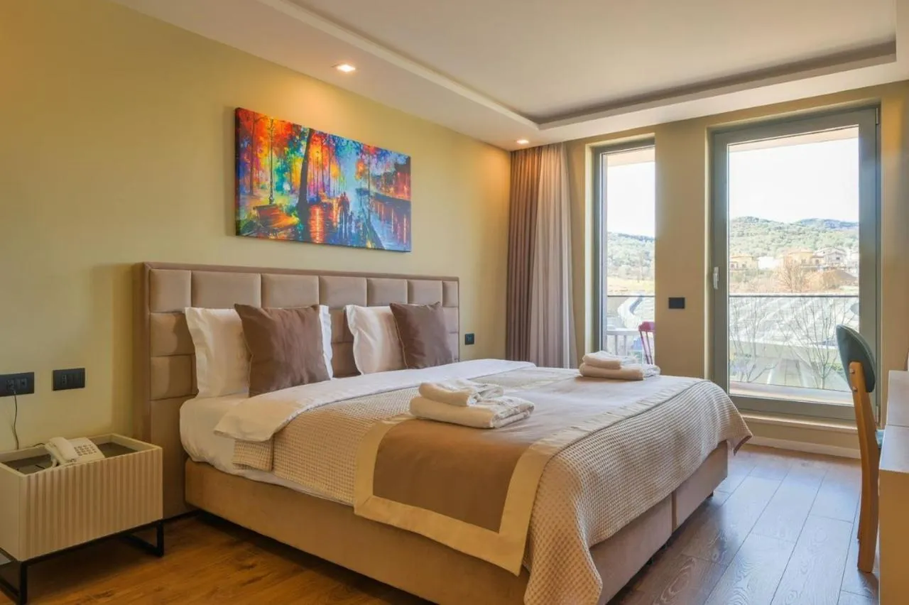 Bed in Royal East Resort