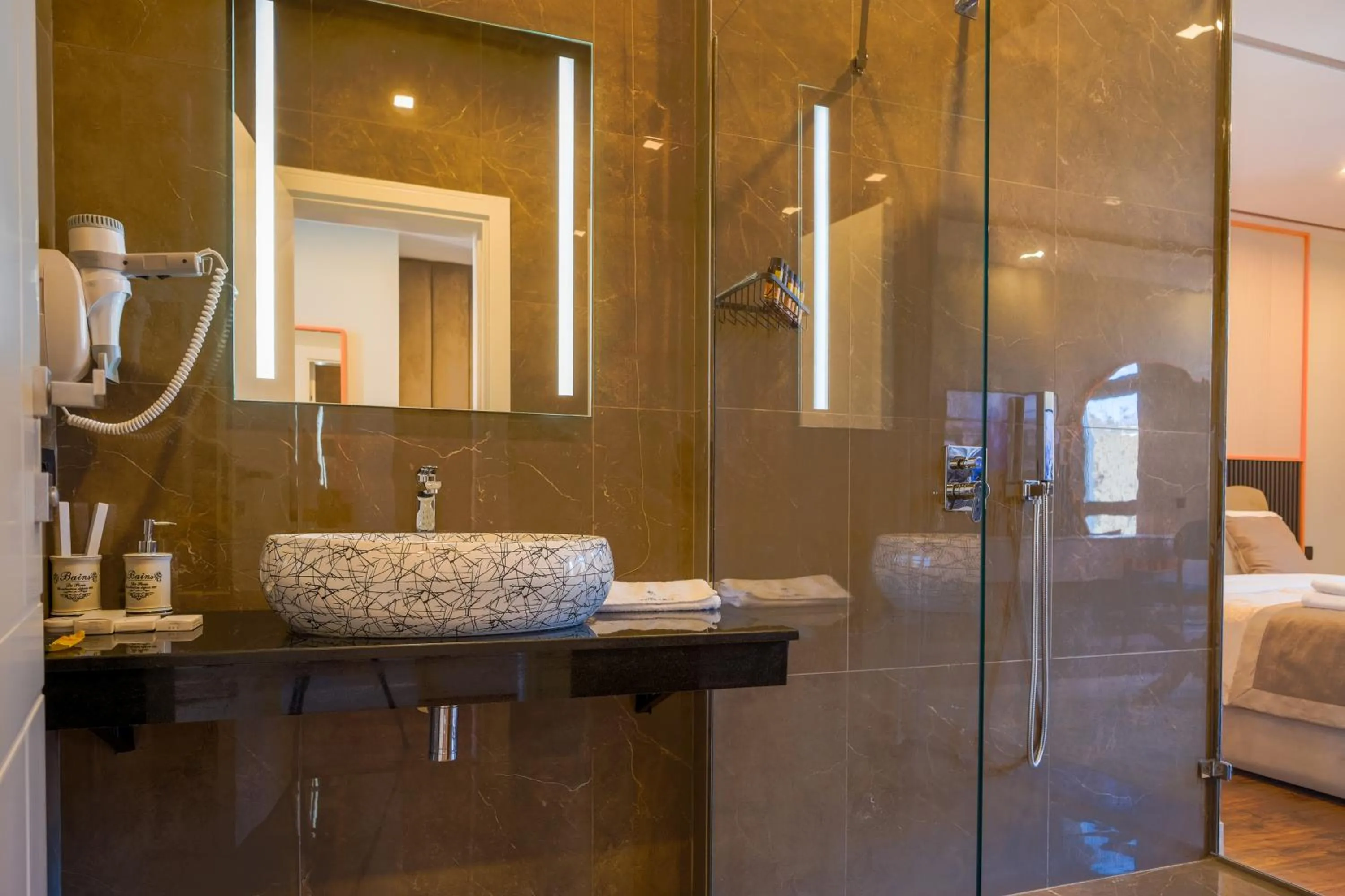 Bathroom, Bed in Royal East Resort