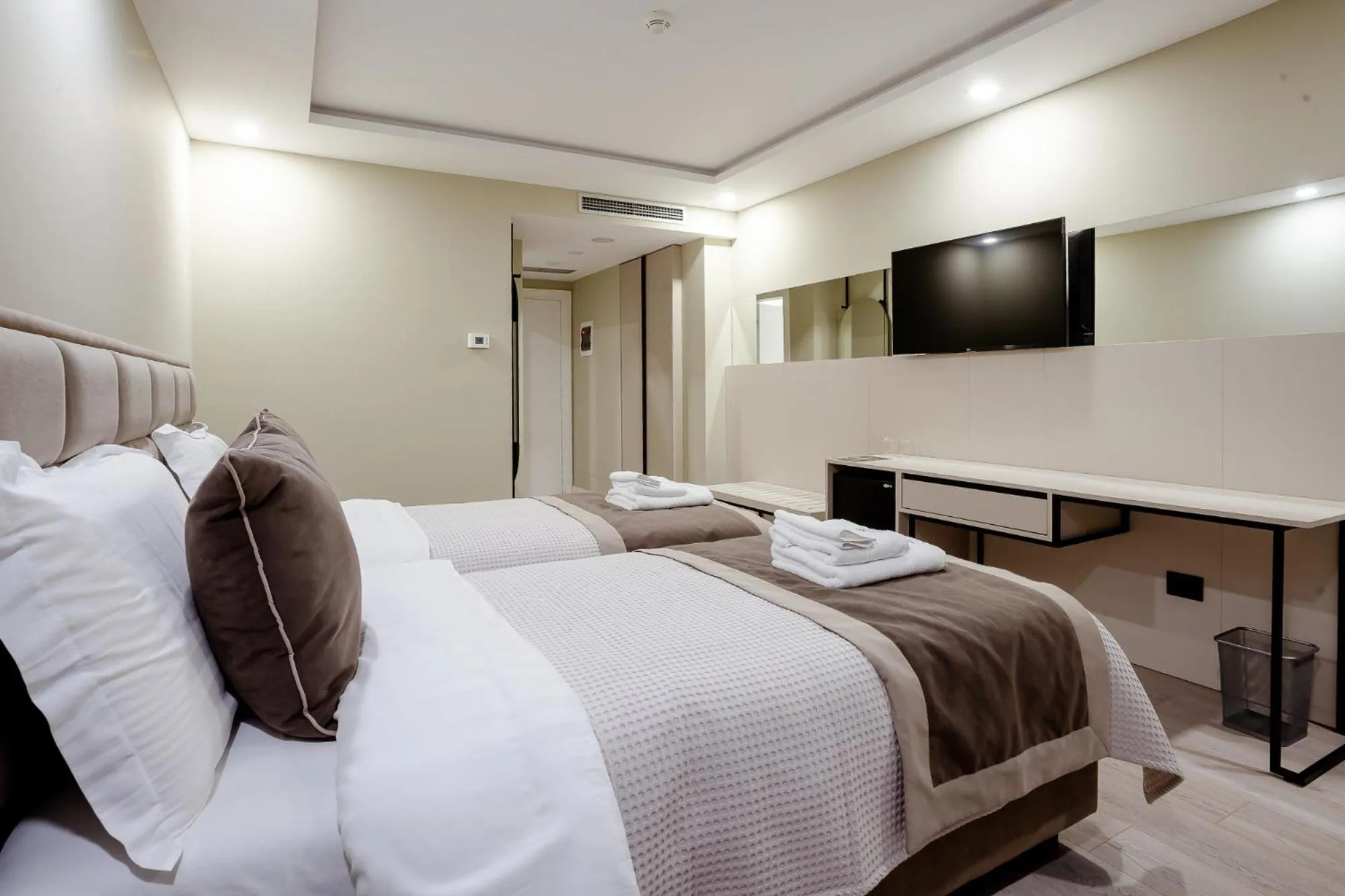 Bed in Royal East Resort