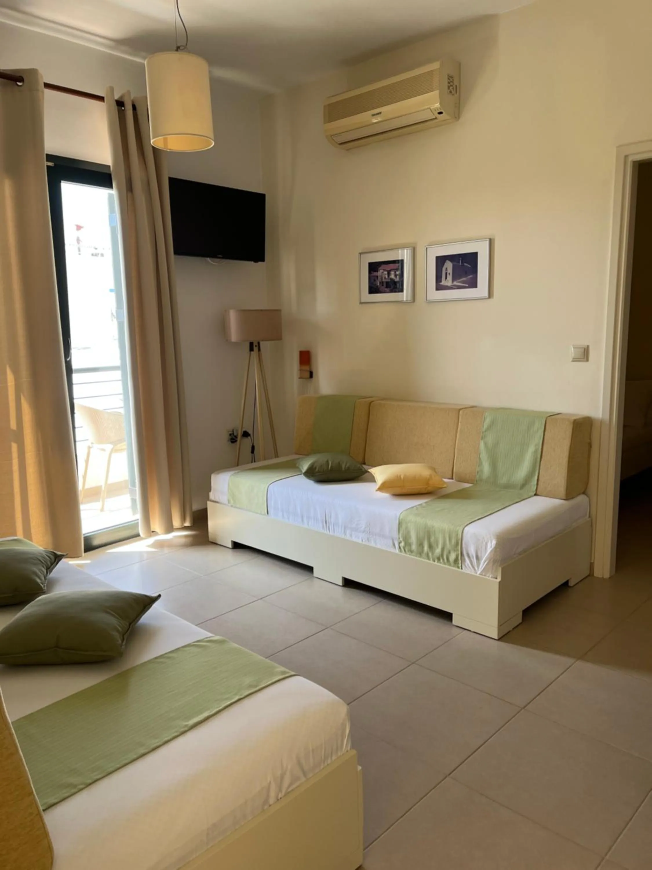 Bed in Myrthe Apartments