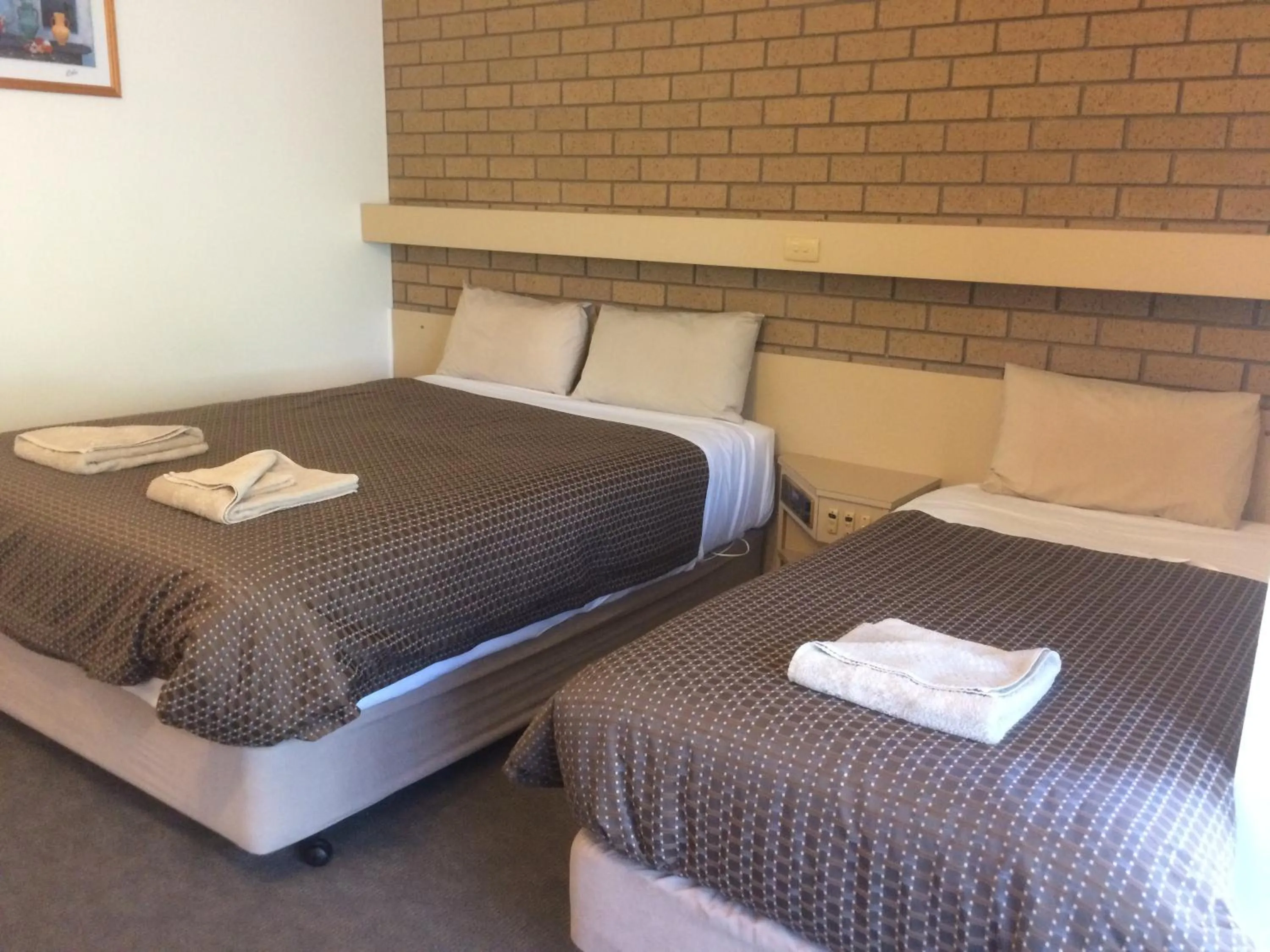 Bed in Ambassador Motor Inn