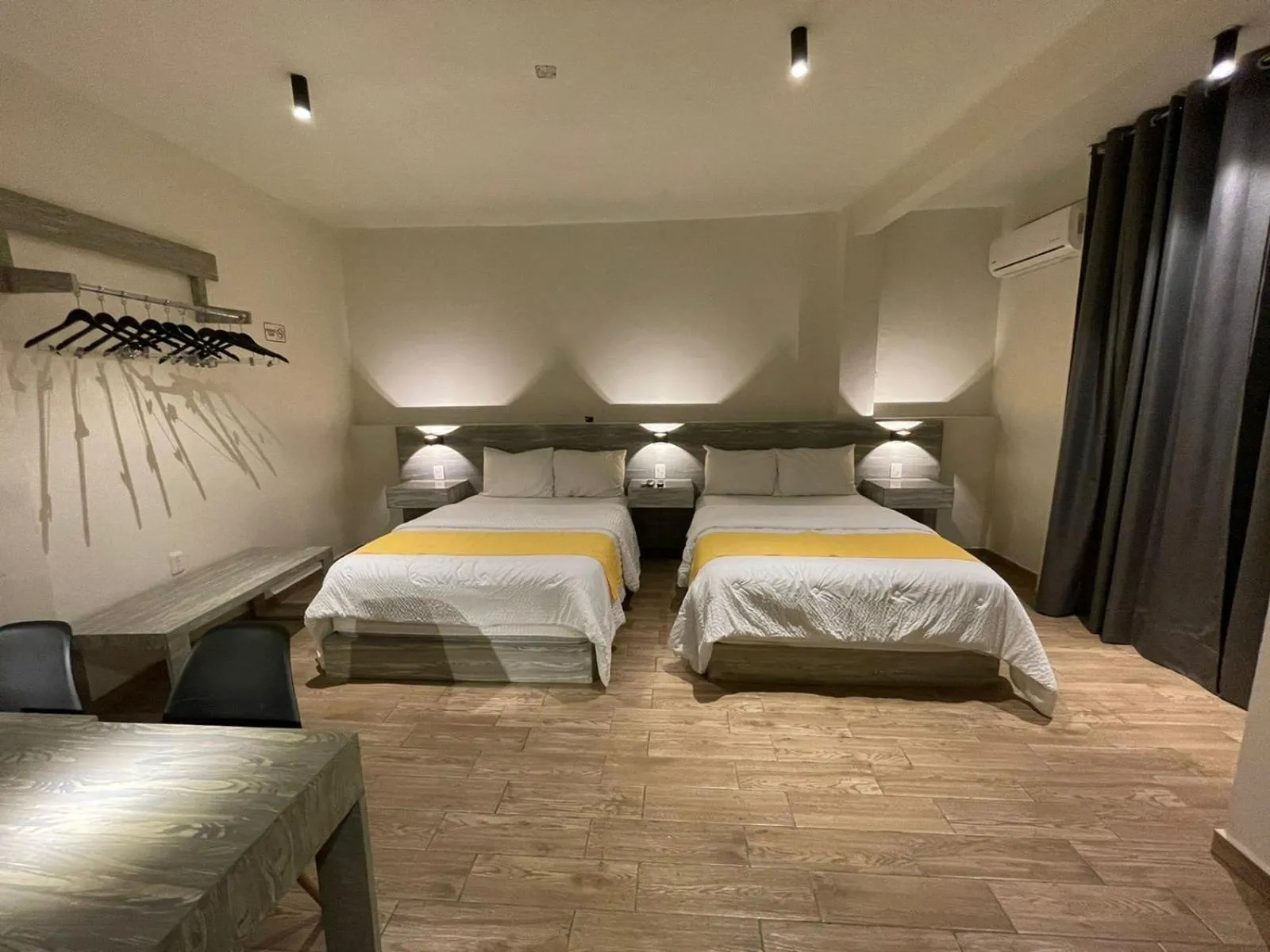 Photo of the whole room, Bed in Capital Suites