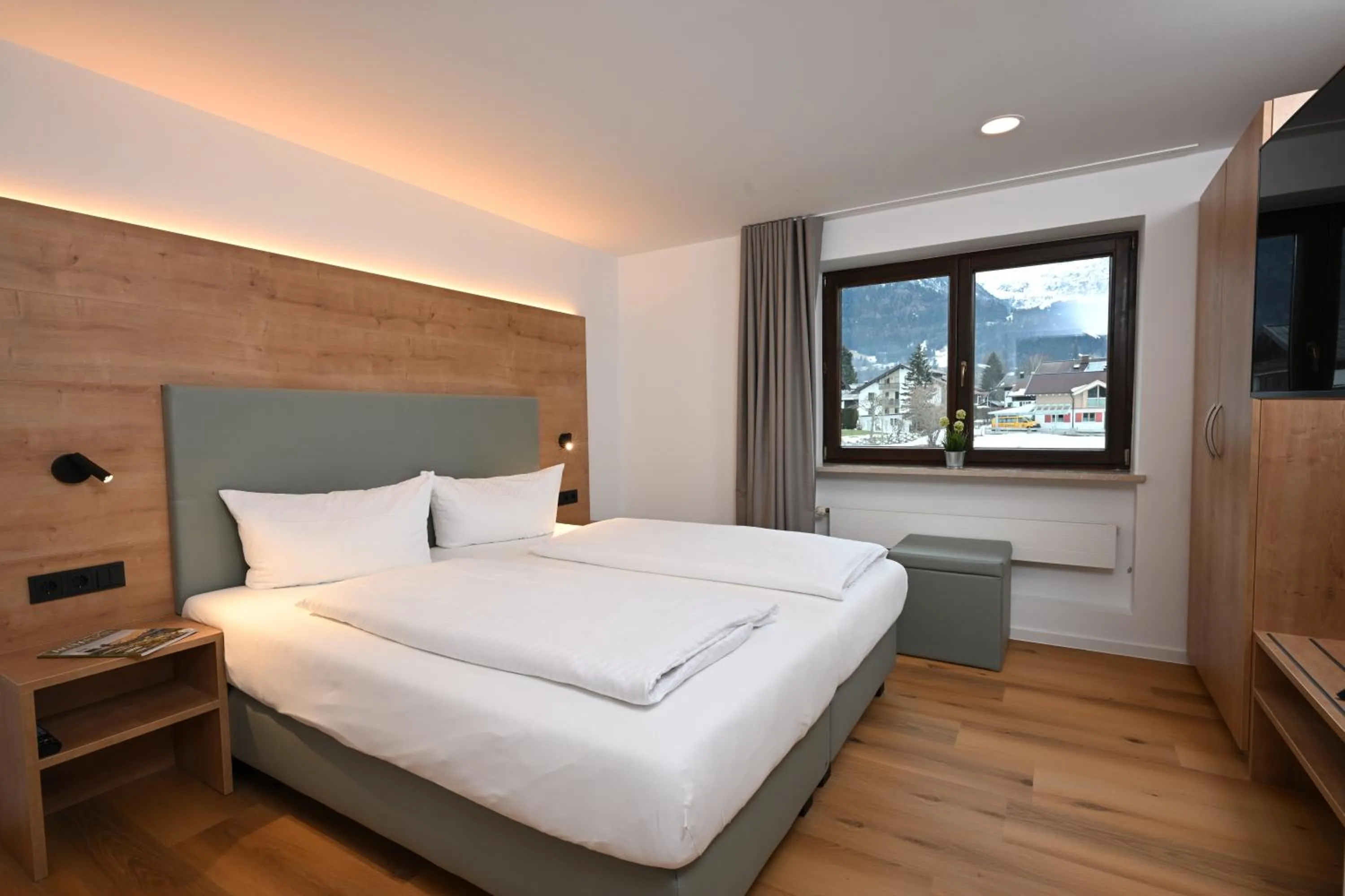 Bedroom, Bed in Alpenhof Oberstdorf Hotel & SPA, Signature Collection by BW