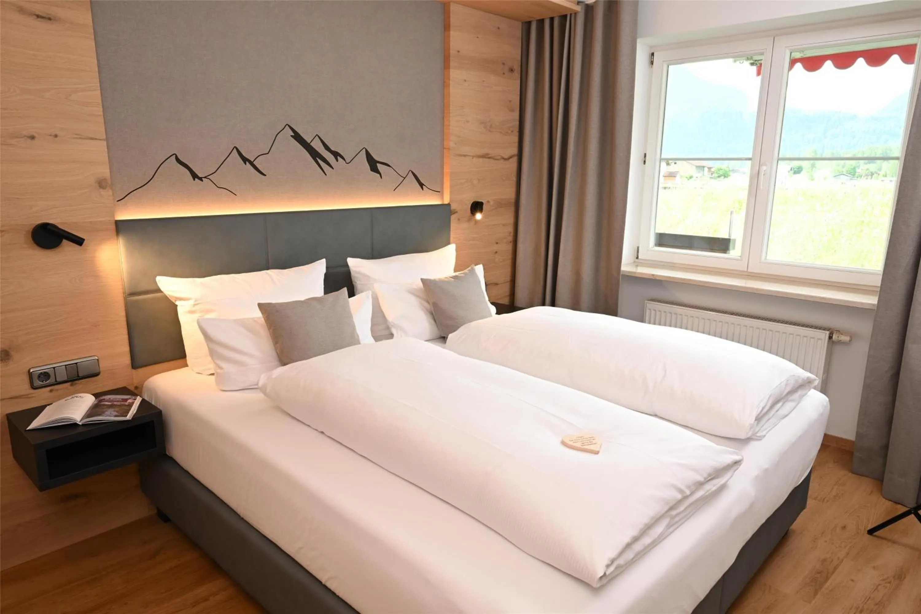 Bedroom, Bed in Alpenhof Oberstdorf Hotel & SPA, Signature Collection by BW