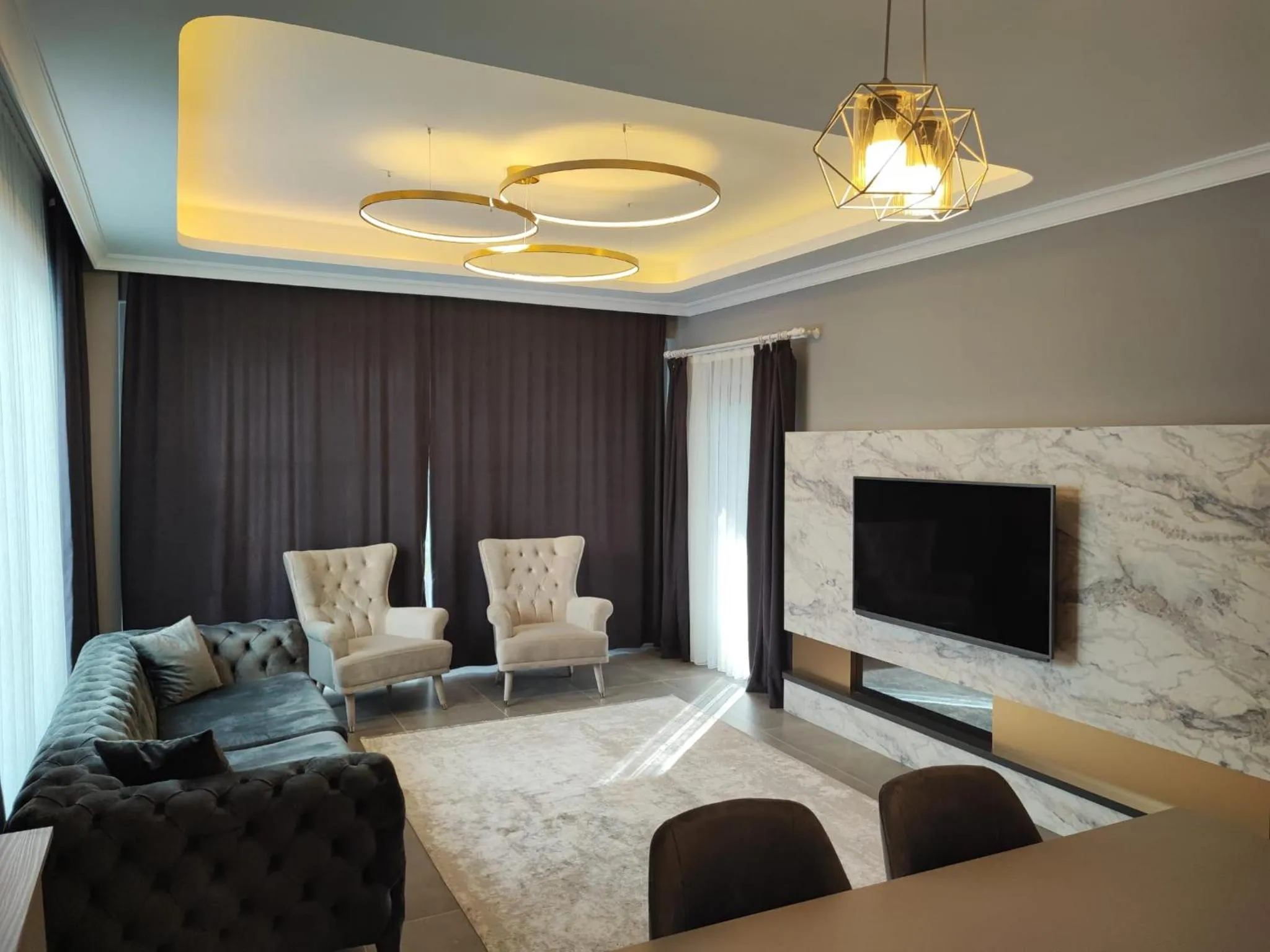 Communal lounge/ TV room in Aileena Hotel & Villas