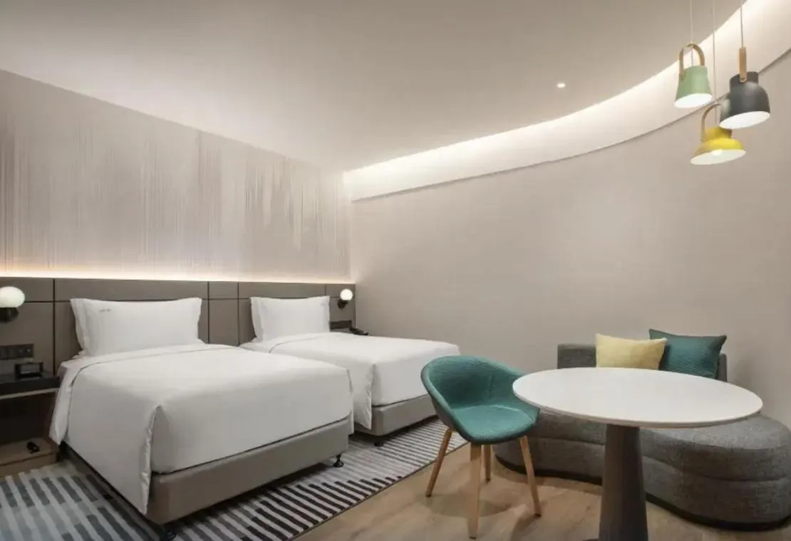 Bed in Holiday Inn Shanghai Nanjing Road by IHG