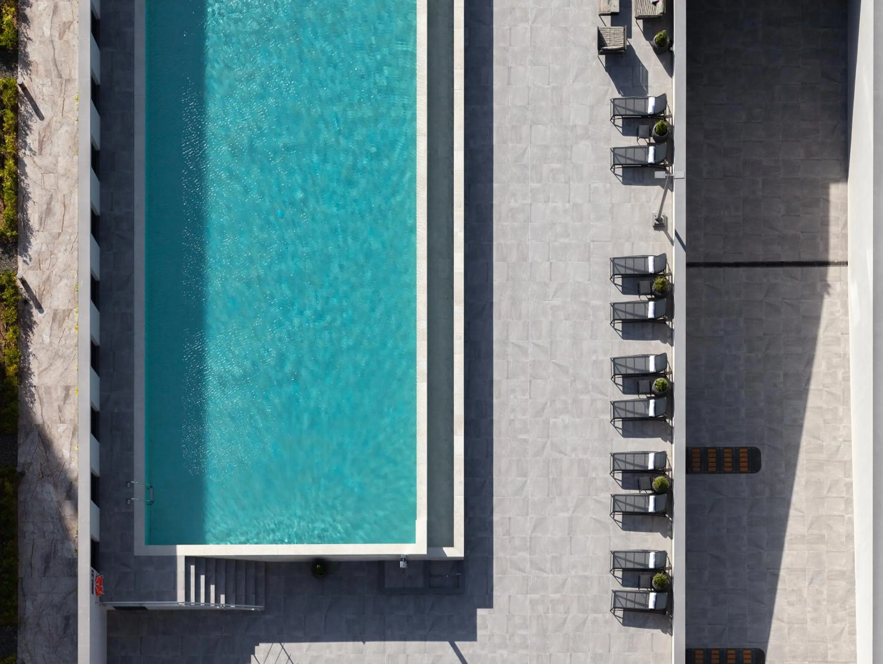 Swimming pool in ONLY Boutique Suites & Residences
