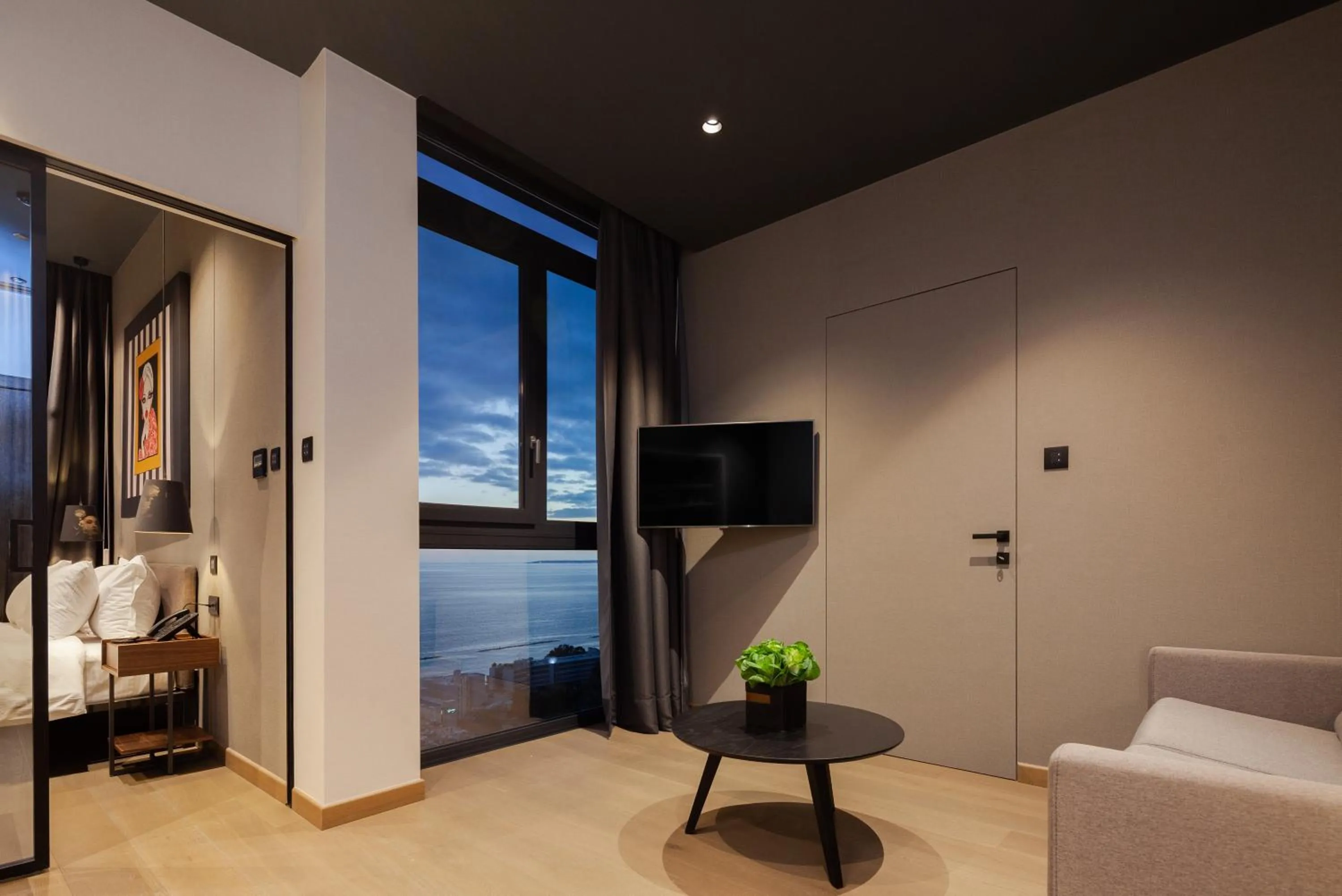 TV and multimedia in ONLY Boutique Suites & Residences