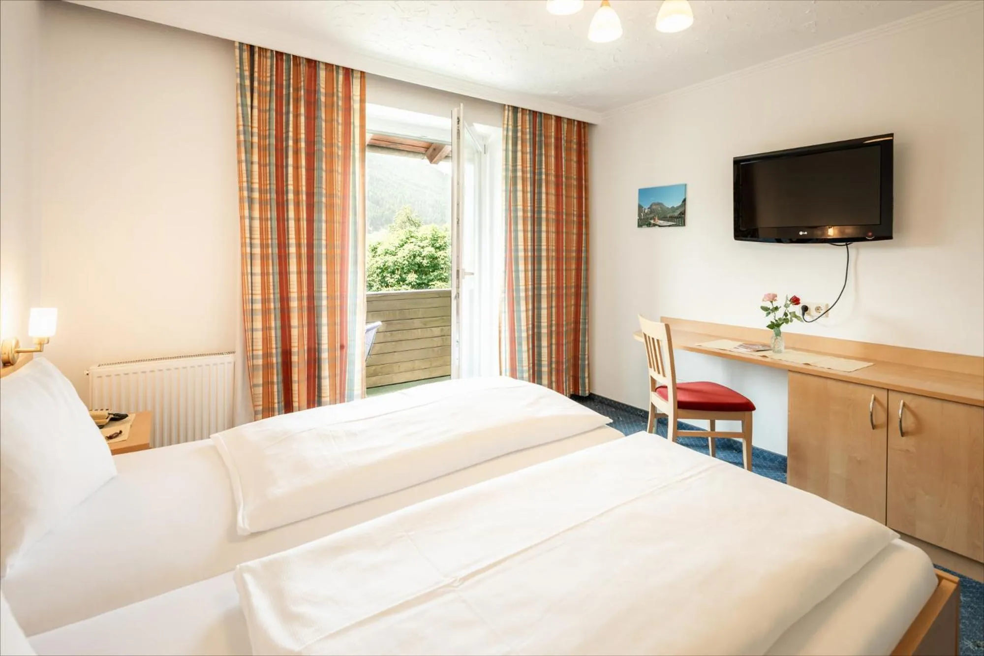 Photo of the whole room, Bed in Landhotel Stofflerwirt