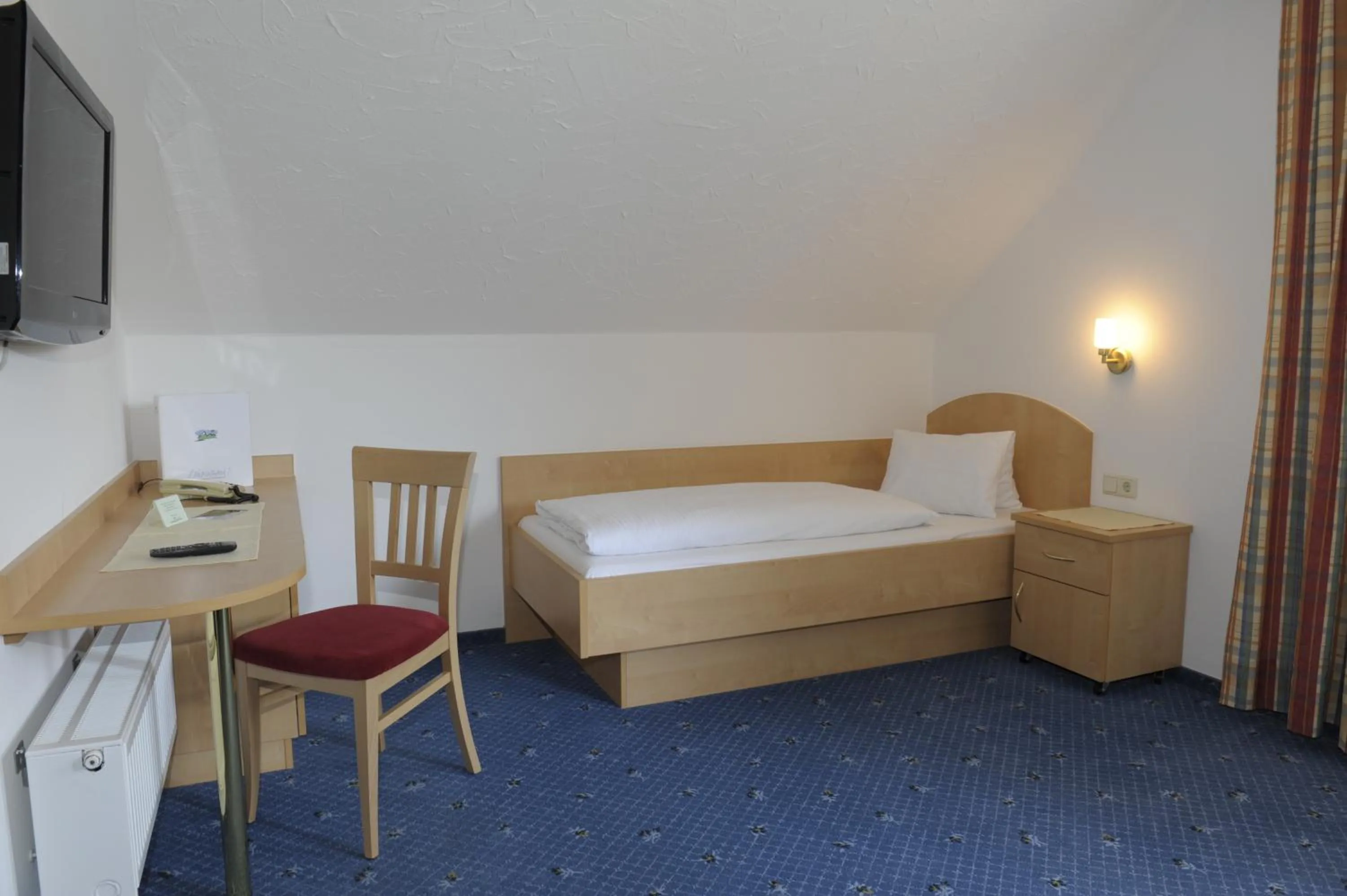 Bed in Landhotel Stofflerwirt