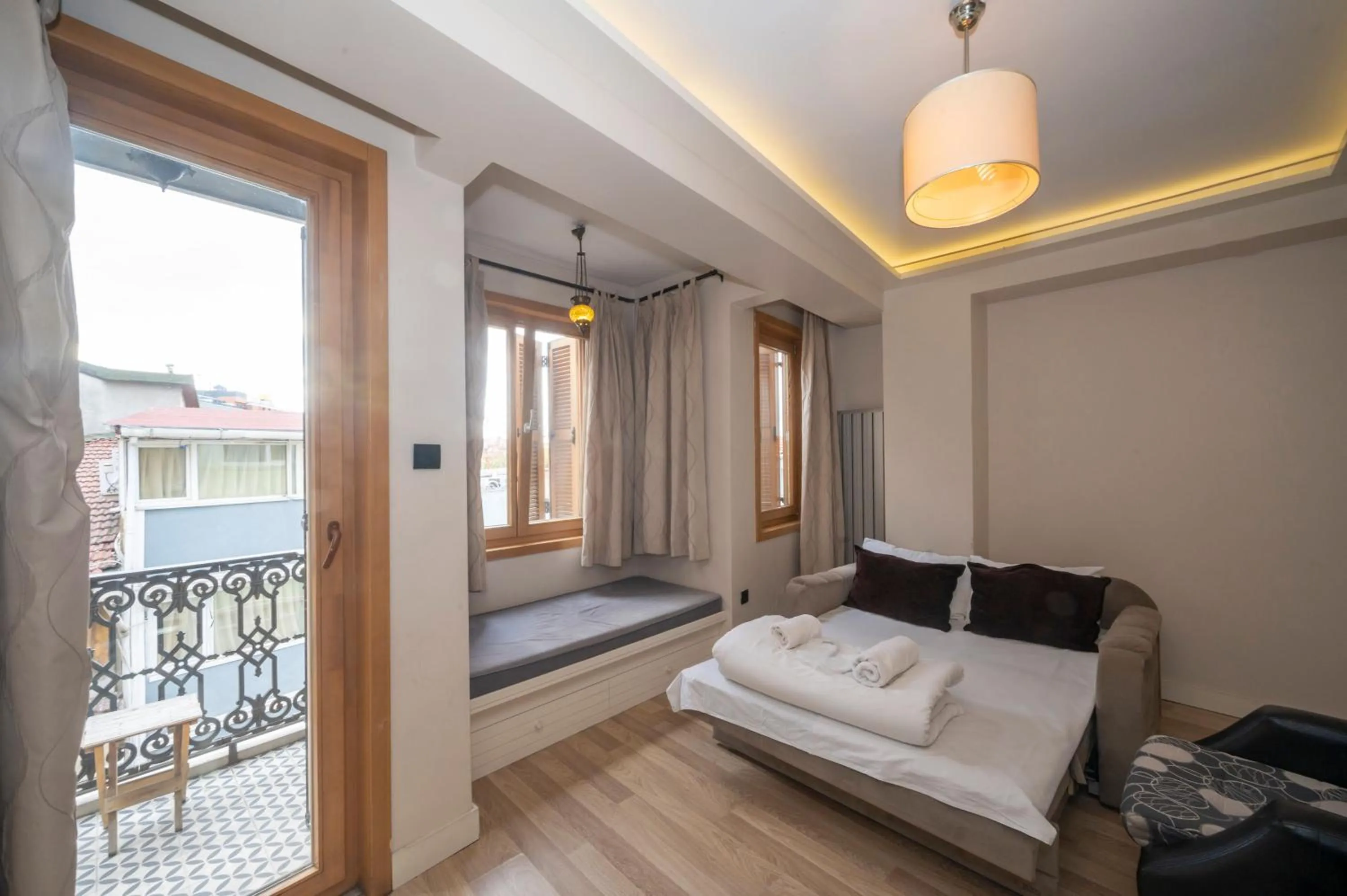 Living room, Bed in T-Loft Residence