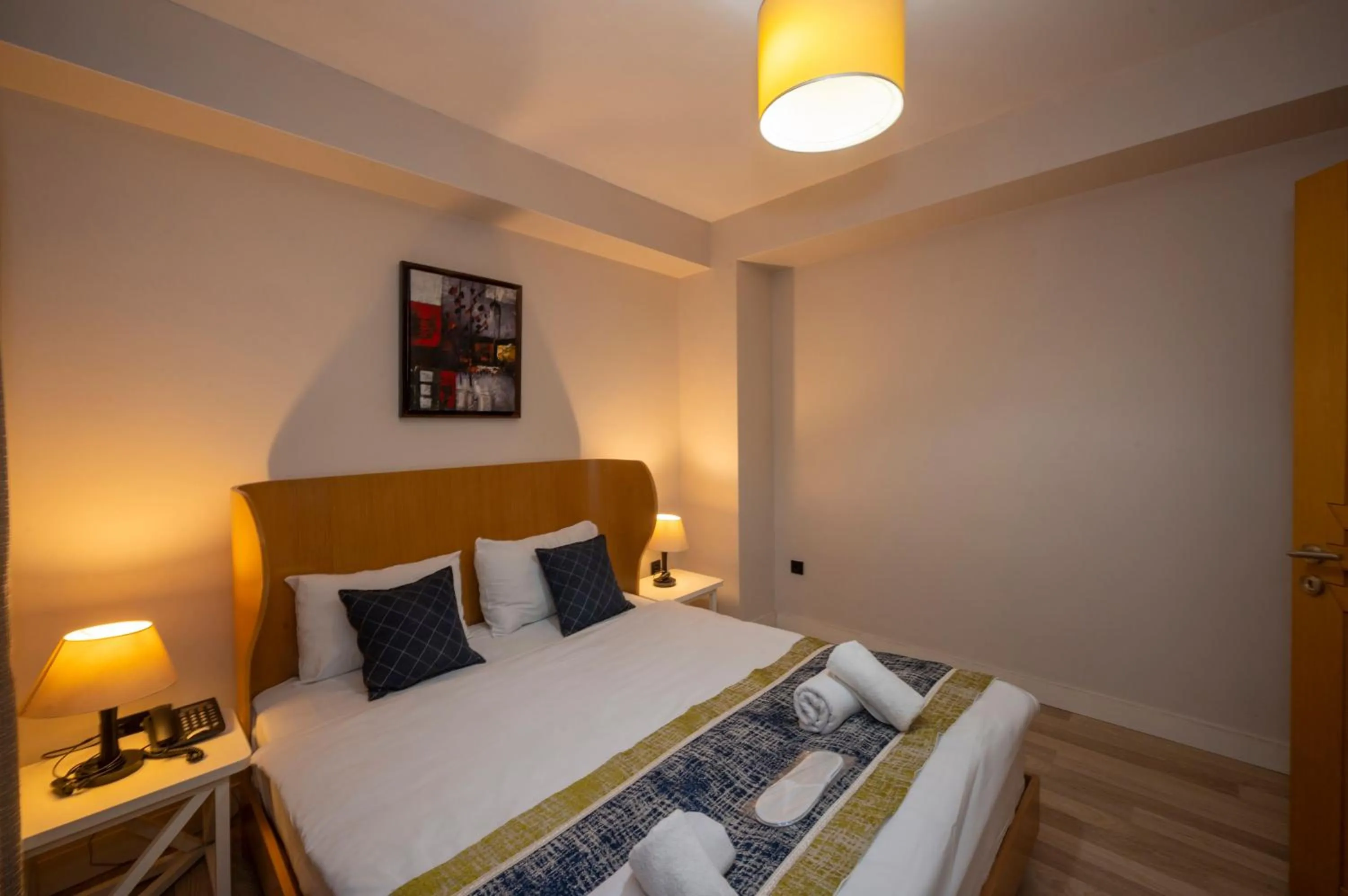 Bed in T-Loft Residence