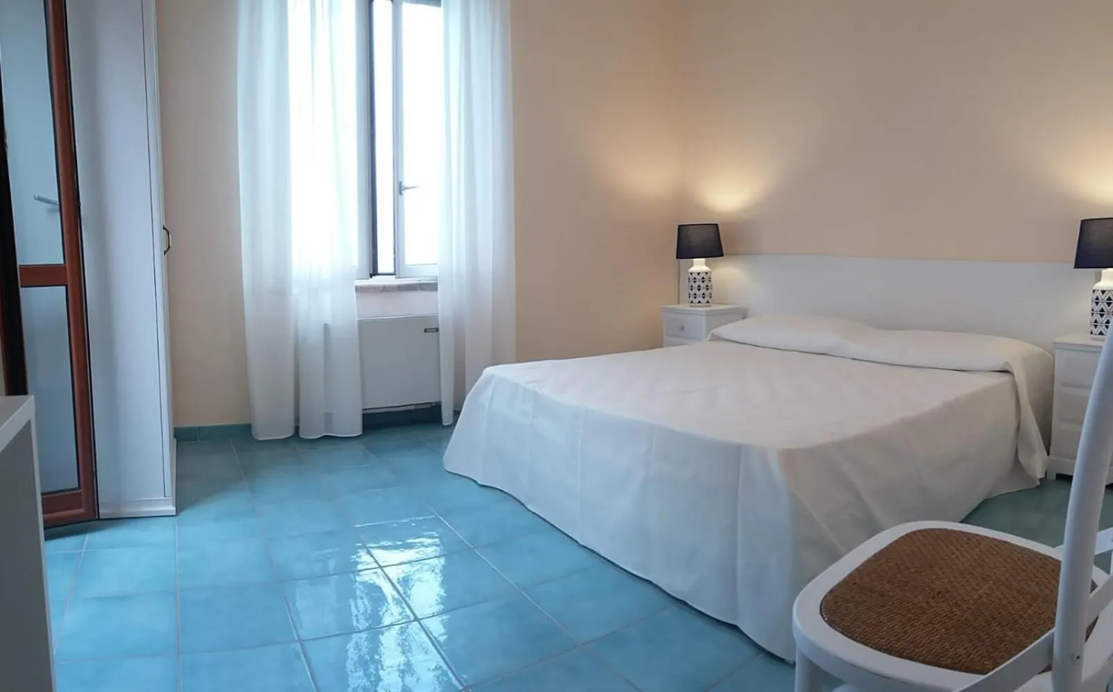 Bed in VILLA FLORA ARGENTARIO