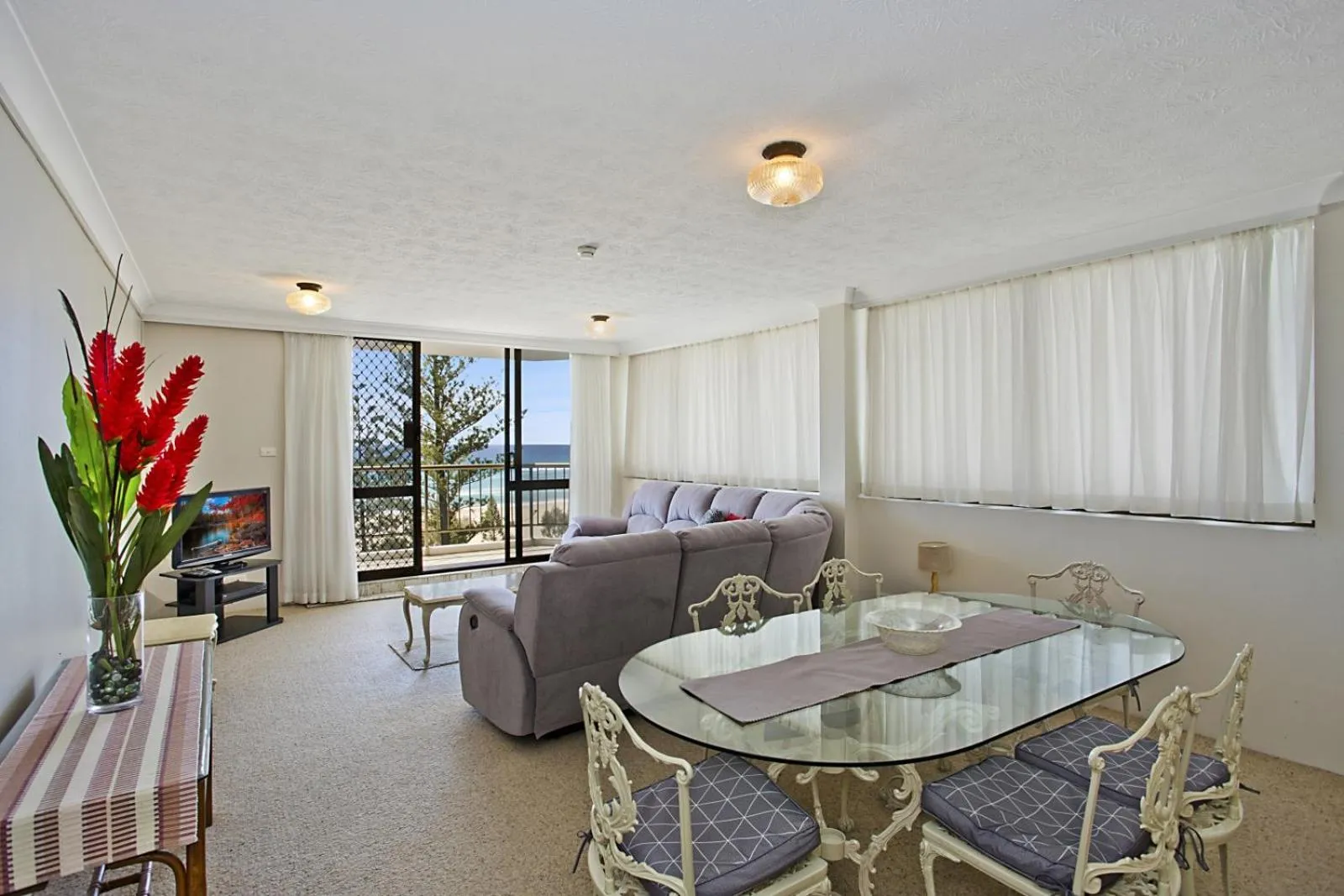 Seating area in Aries Holiday Apartments