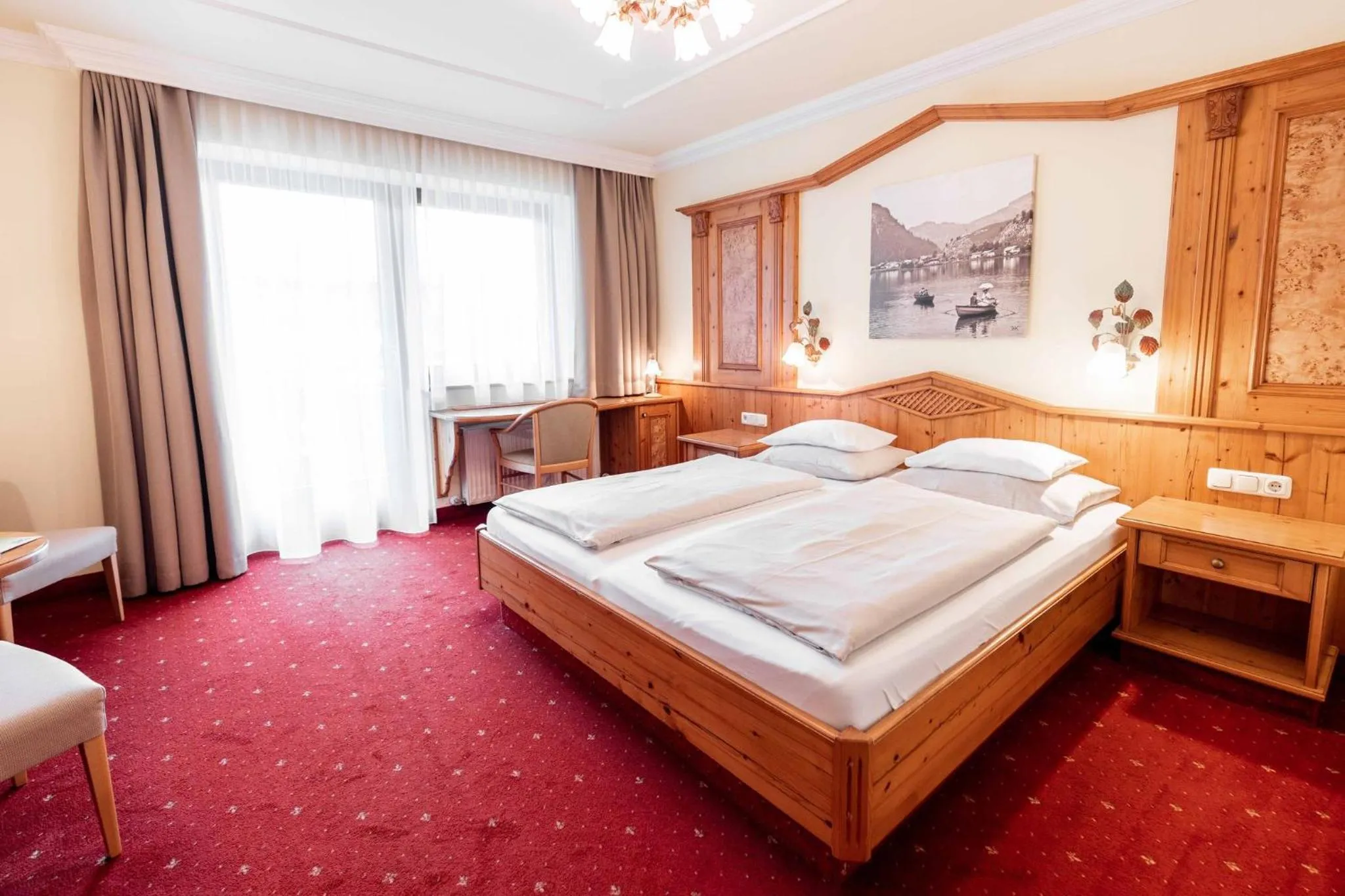 Photo of the whole room, Bed in Das Walchsee Resort