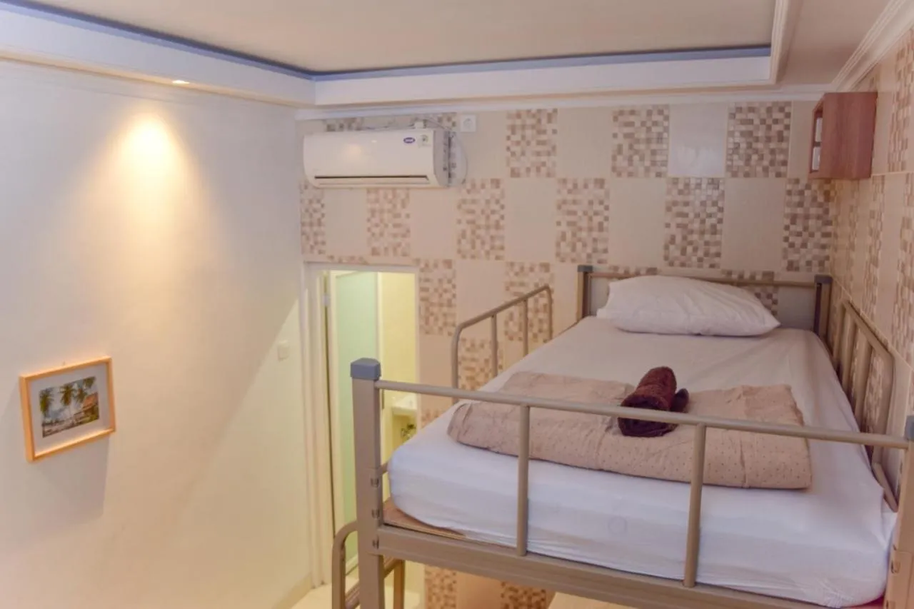 Bed in The Cabin Purwokinanti Hotel