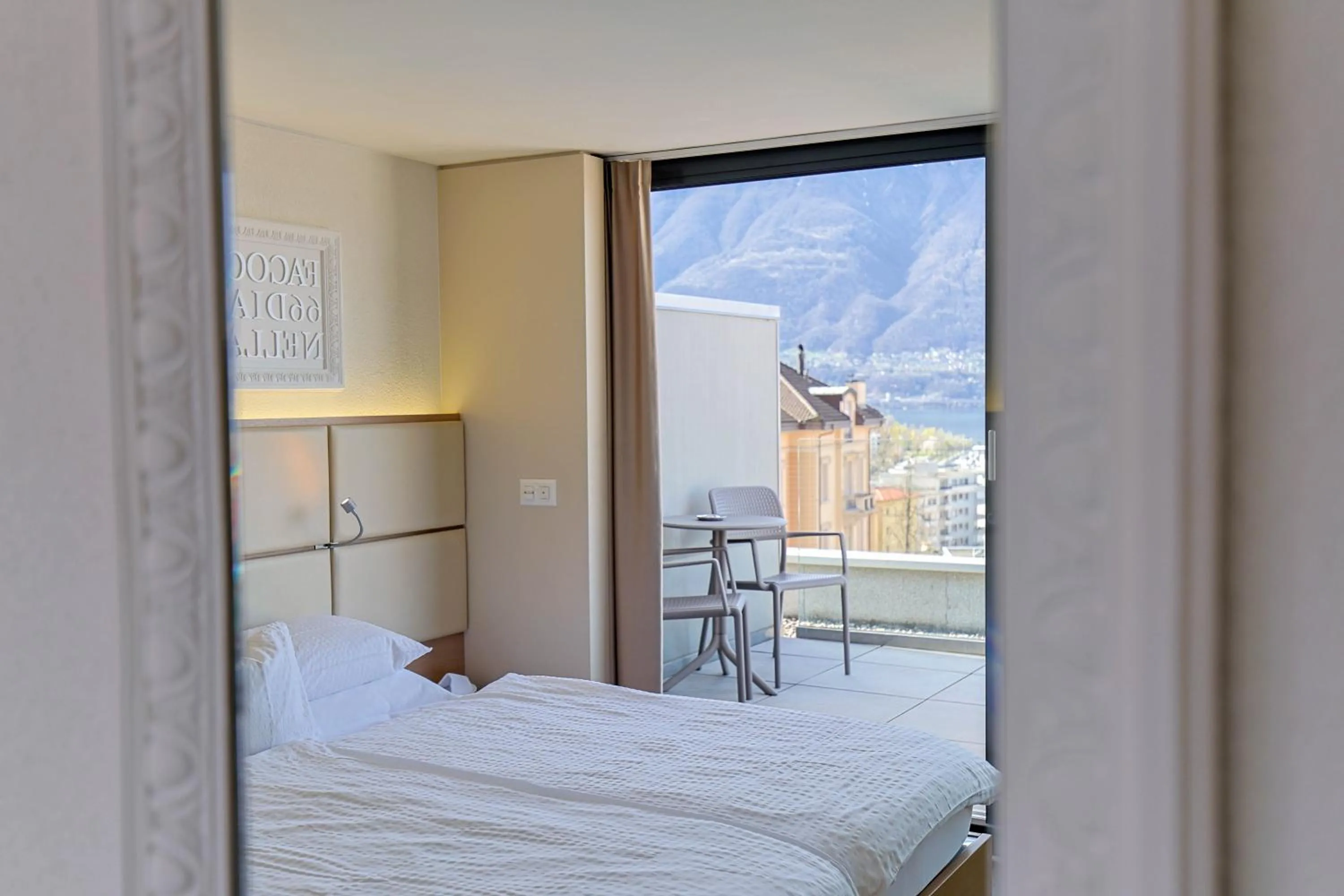 View (from property/room), Bed in Hotel Muralto Locarno