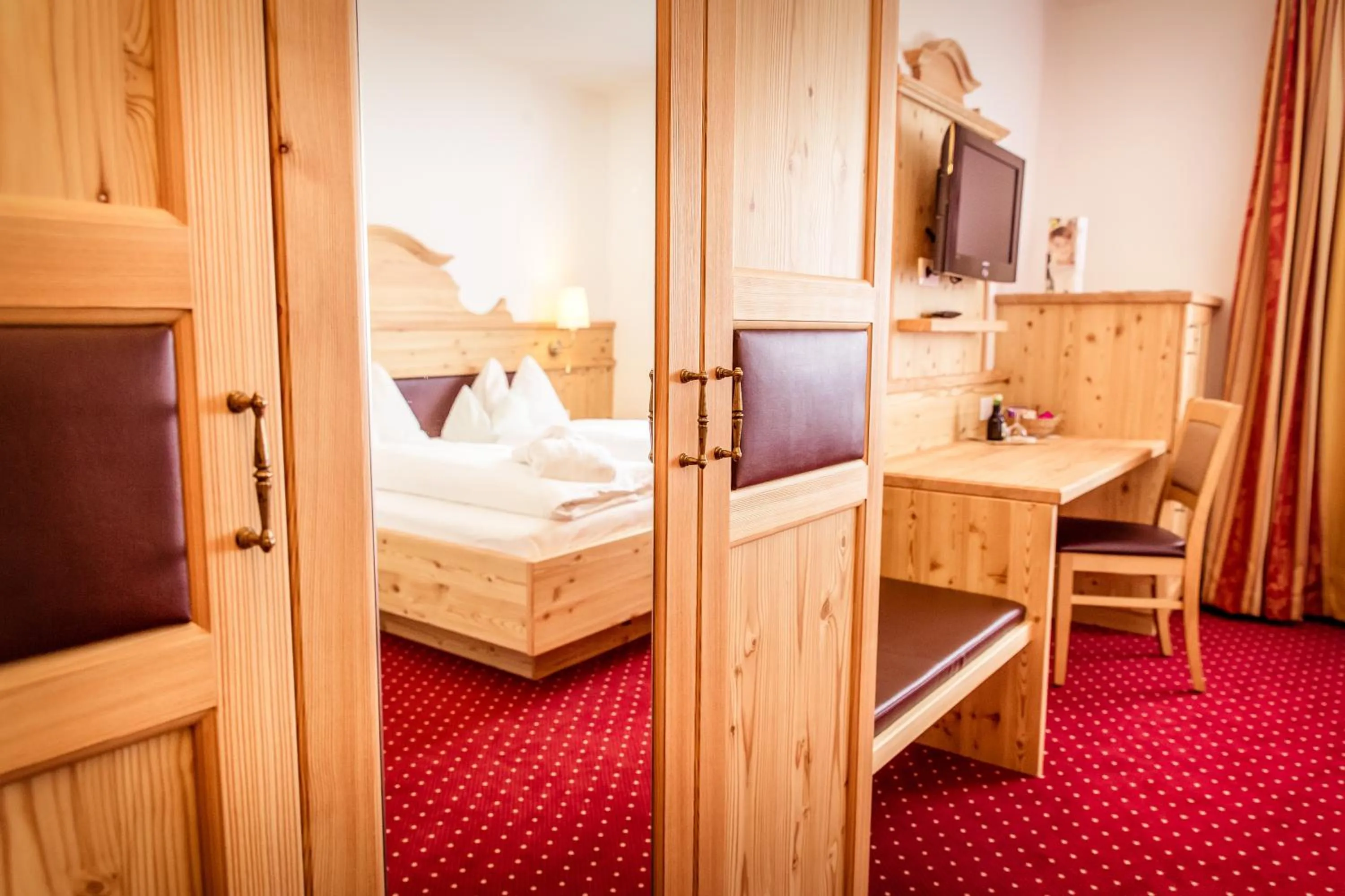 Decorative detail, Bed in Hotel Trattlerhof