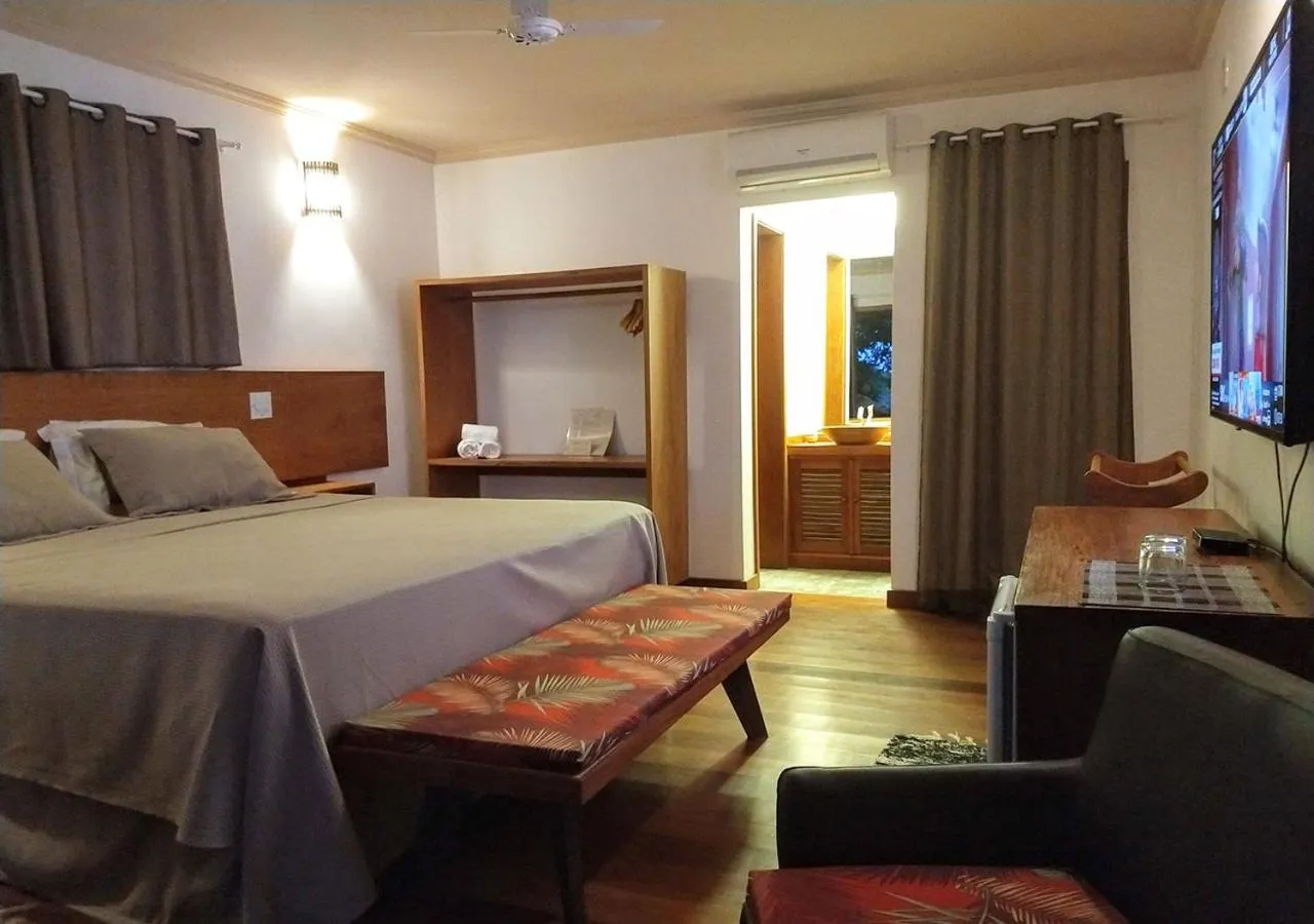 Photo of the whole room, Bed in Pousada Vila Araticum