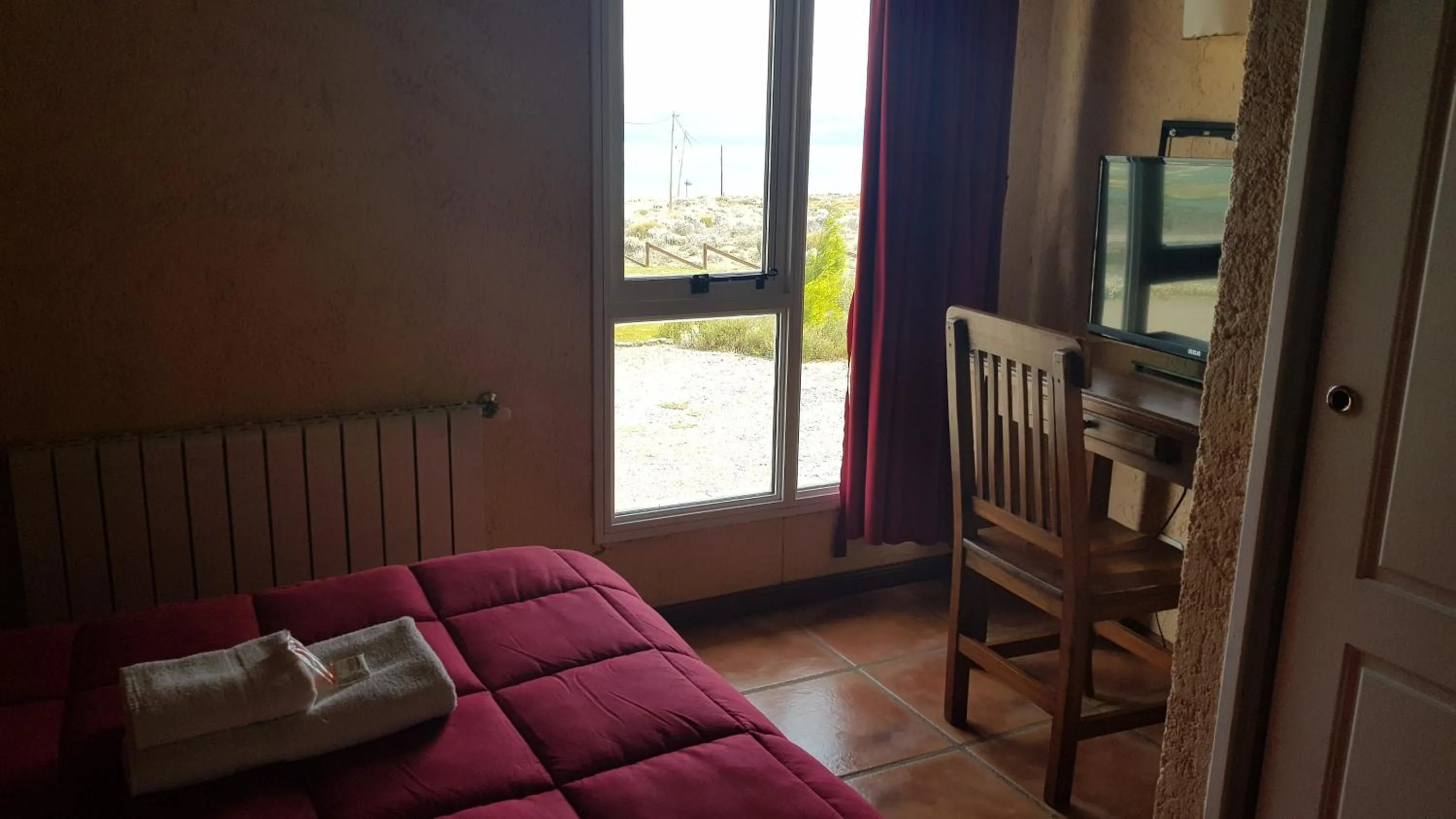 Photo of the whole room in Fuerte Calafate Hotel Panorámico