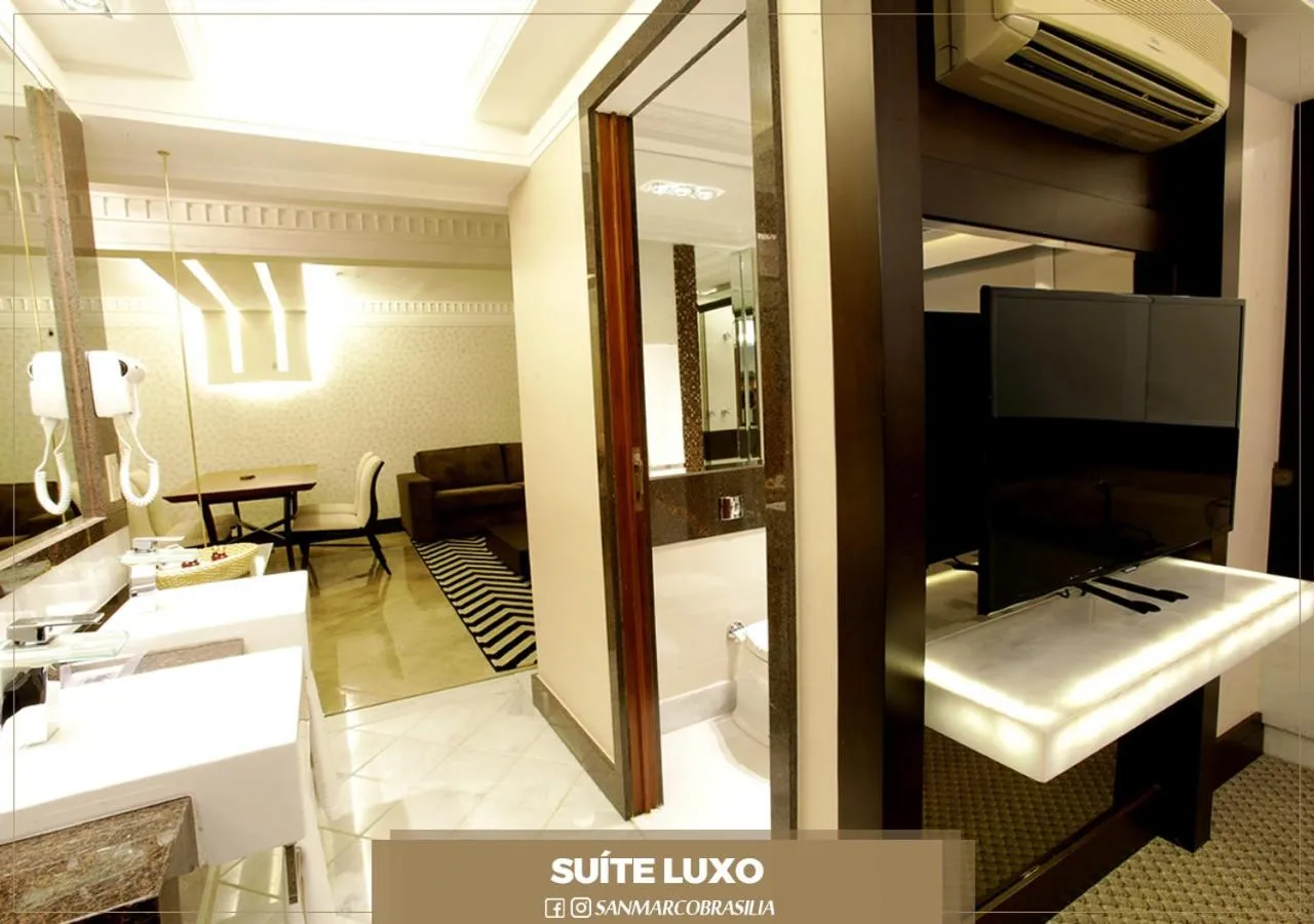 Communal lounge/ TV room, Bed in San Marco Hotel Brasília