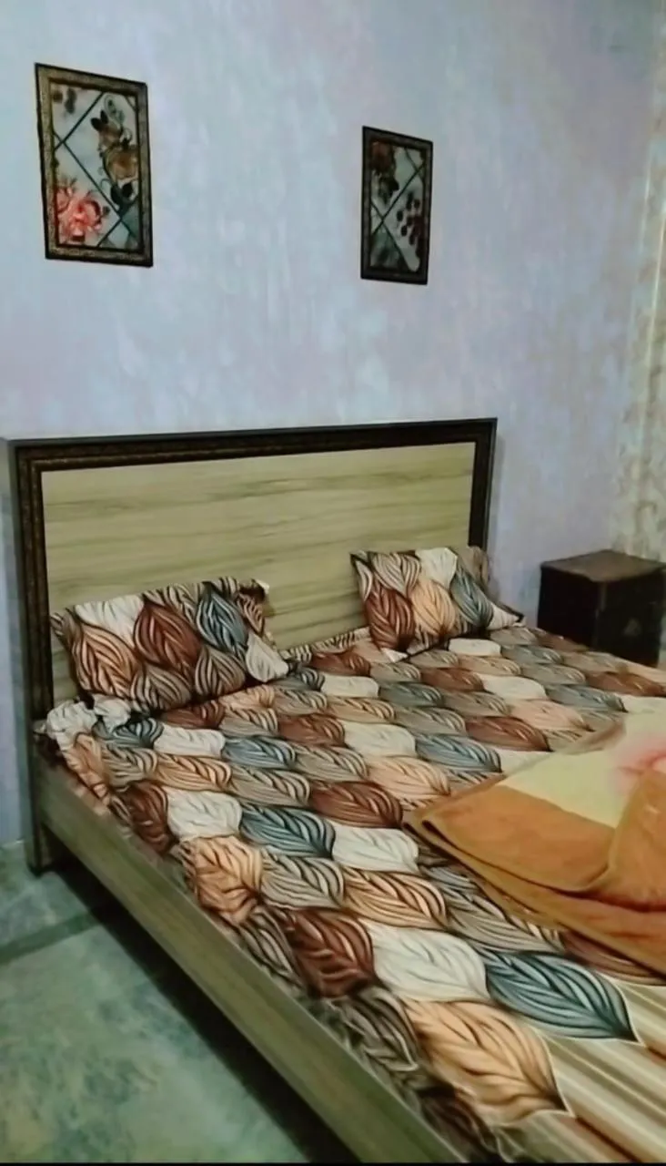 Bed in New Taj Hotel