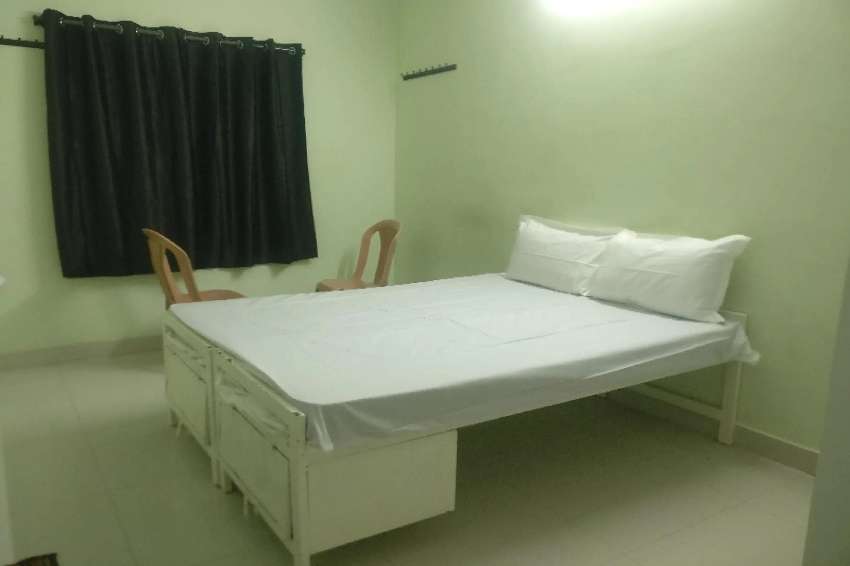Bedroom in Hotel O REDDY'S GRAND LUXURY ROOMS