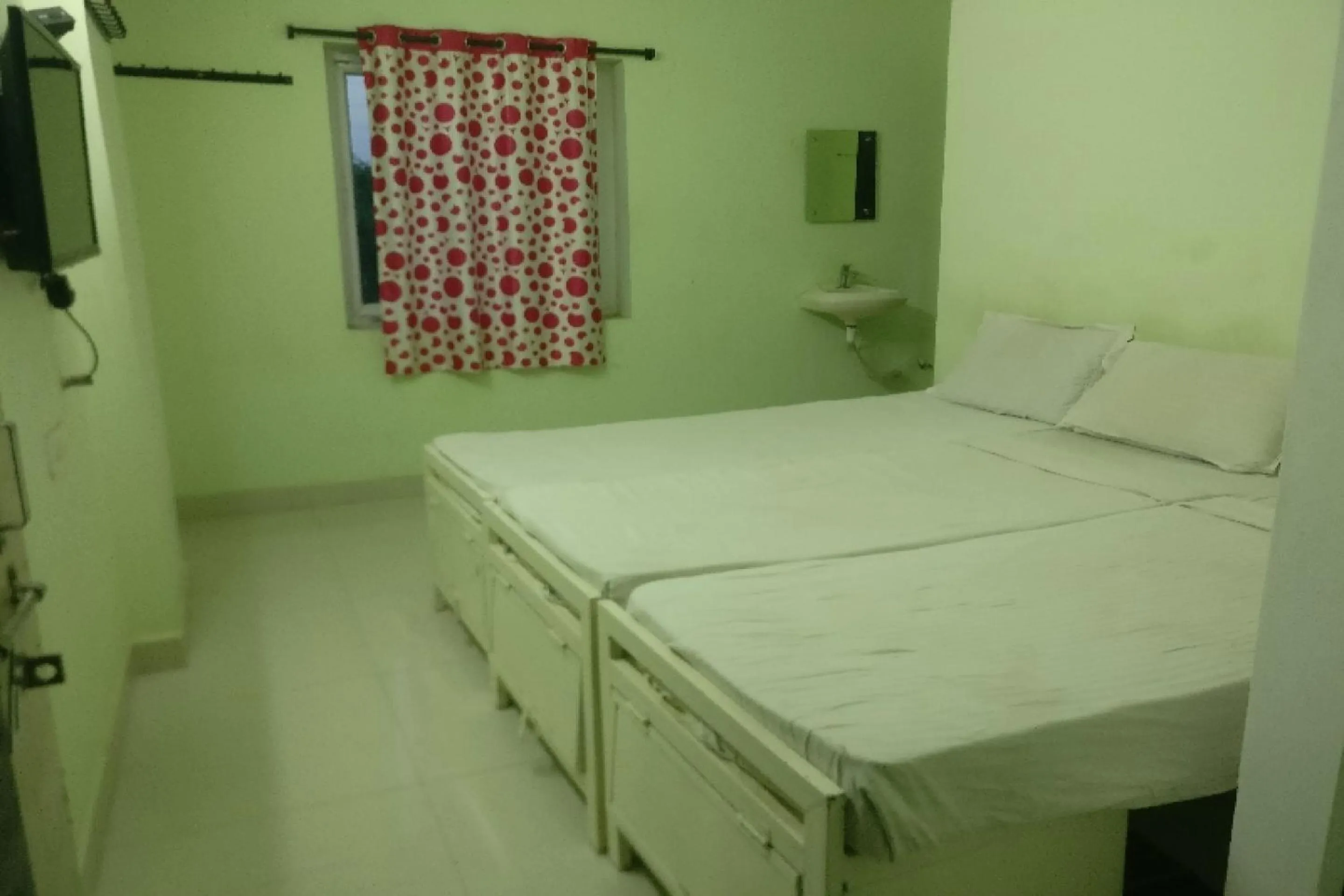 Bedroom in Hotel O REDDY'S GRAND LUXURY ROOMS