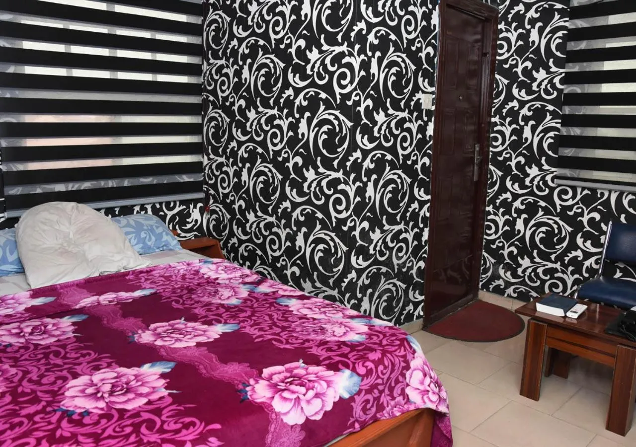 Bed in 24-7 Electricity Agore Hotels and Suites Ltd