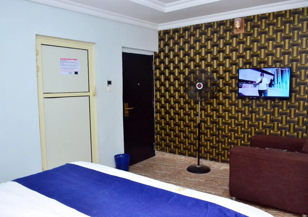 Bed in 24-7 Electricity Agore Hotels and Suites Ltd