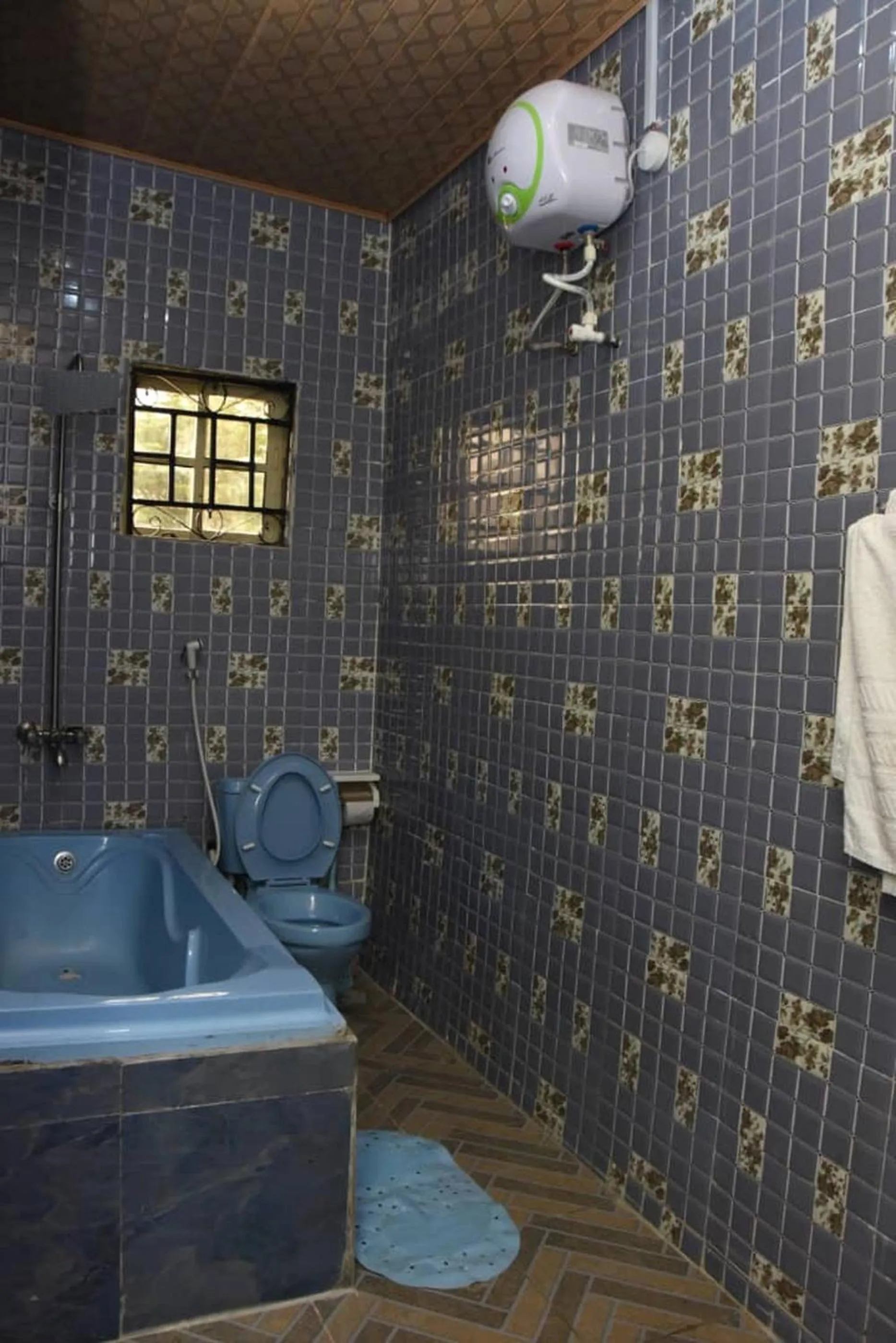 Toilet in 24-7 Electricity Agore Hotels and Suites Ltd