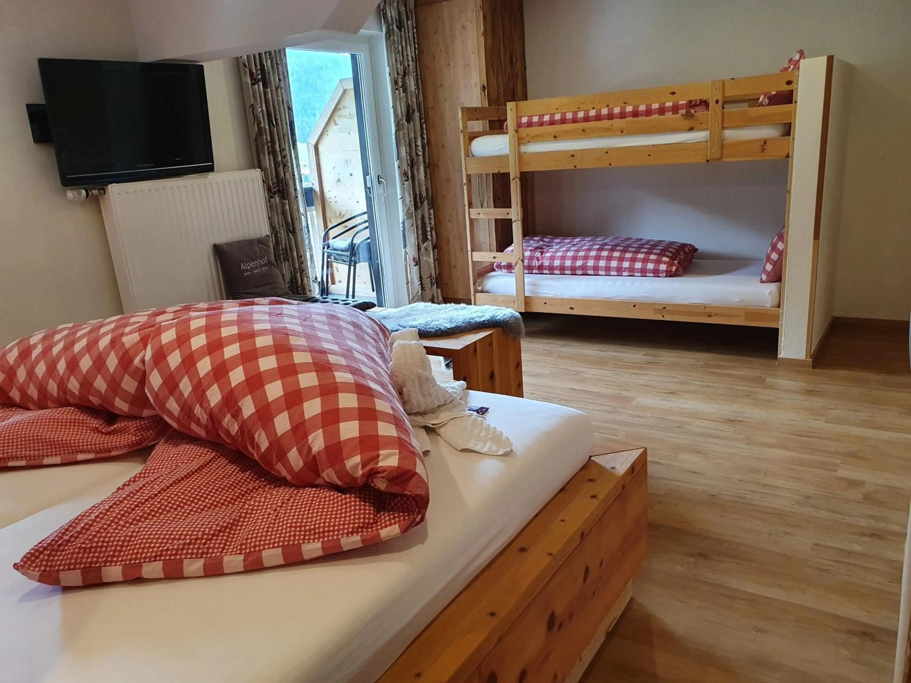 Photo of the whole room, Bed in Boutique Hotel Alpenhof