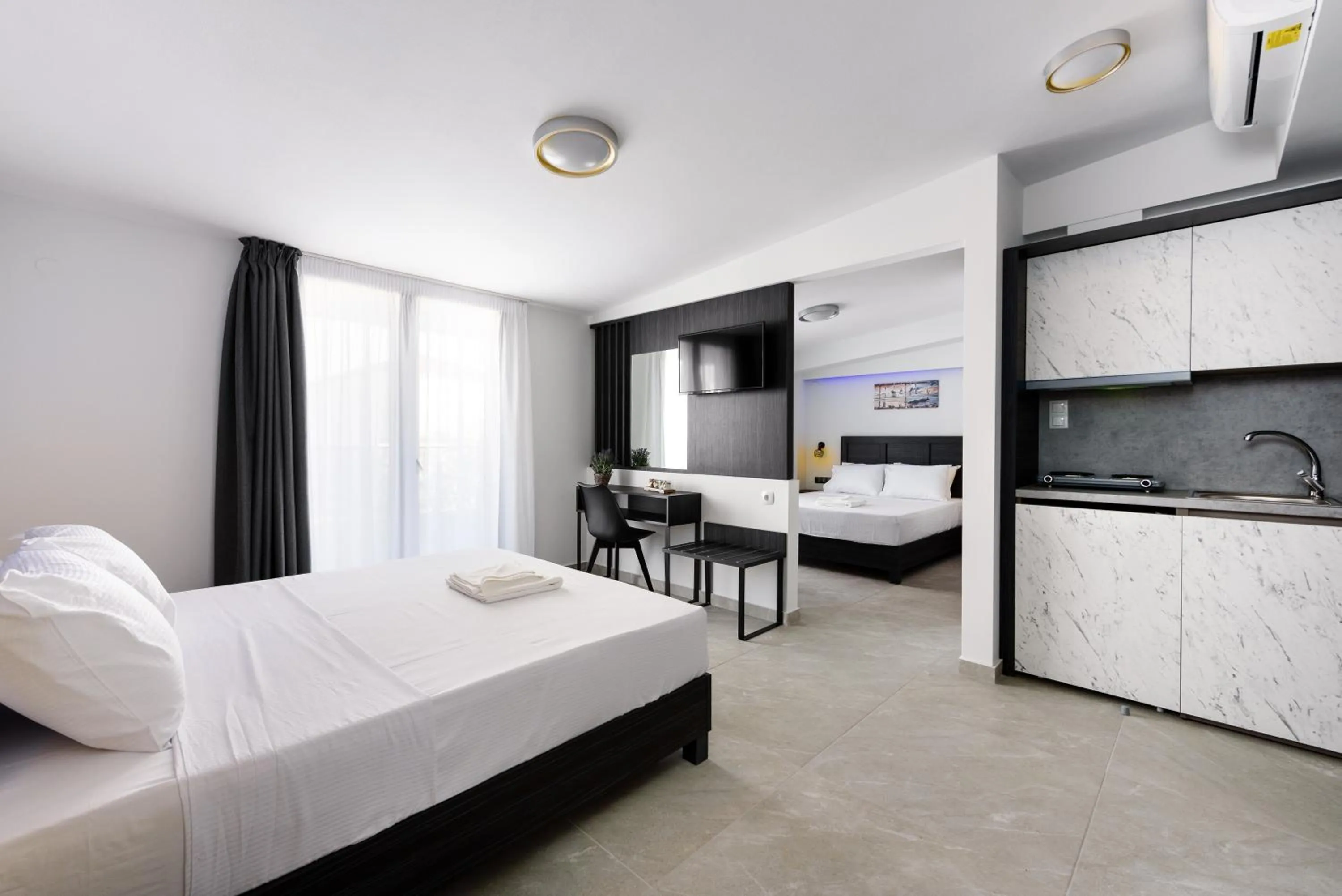 Photo of the whole room, Bed in ASTERAS STUDIOS