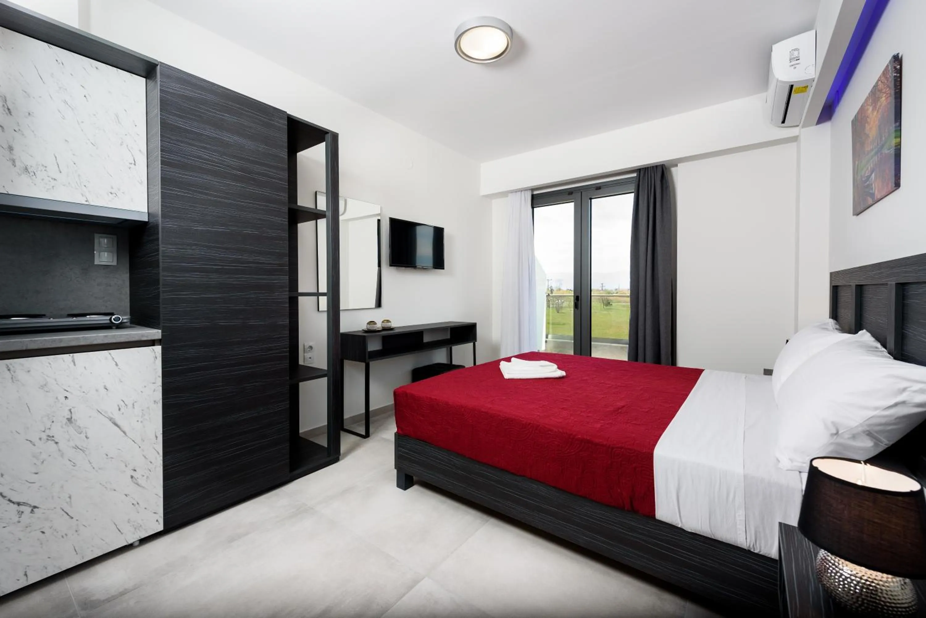 Photo of the whole room, Bed in ASTERAS STUDIOS