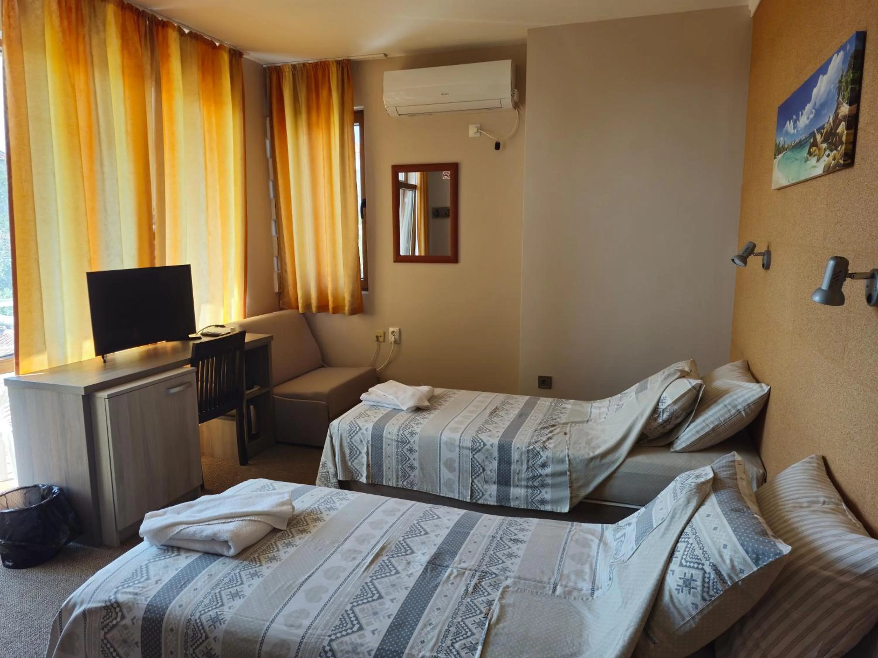 Bed in Family hotel Favourite