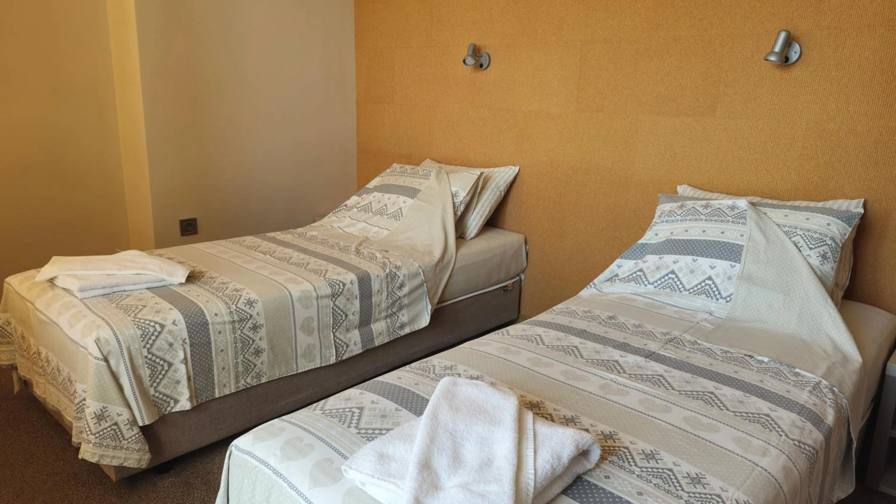 Bed in Family hotel Favourite