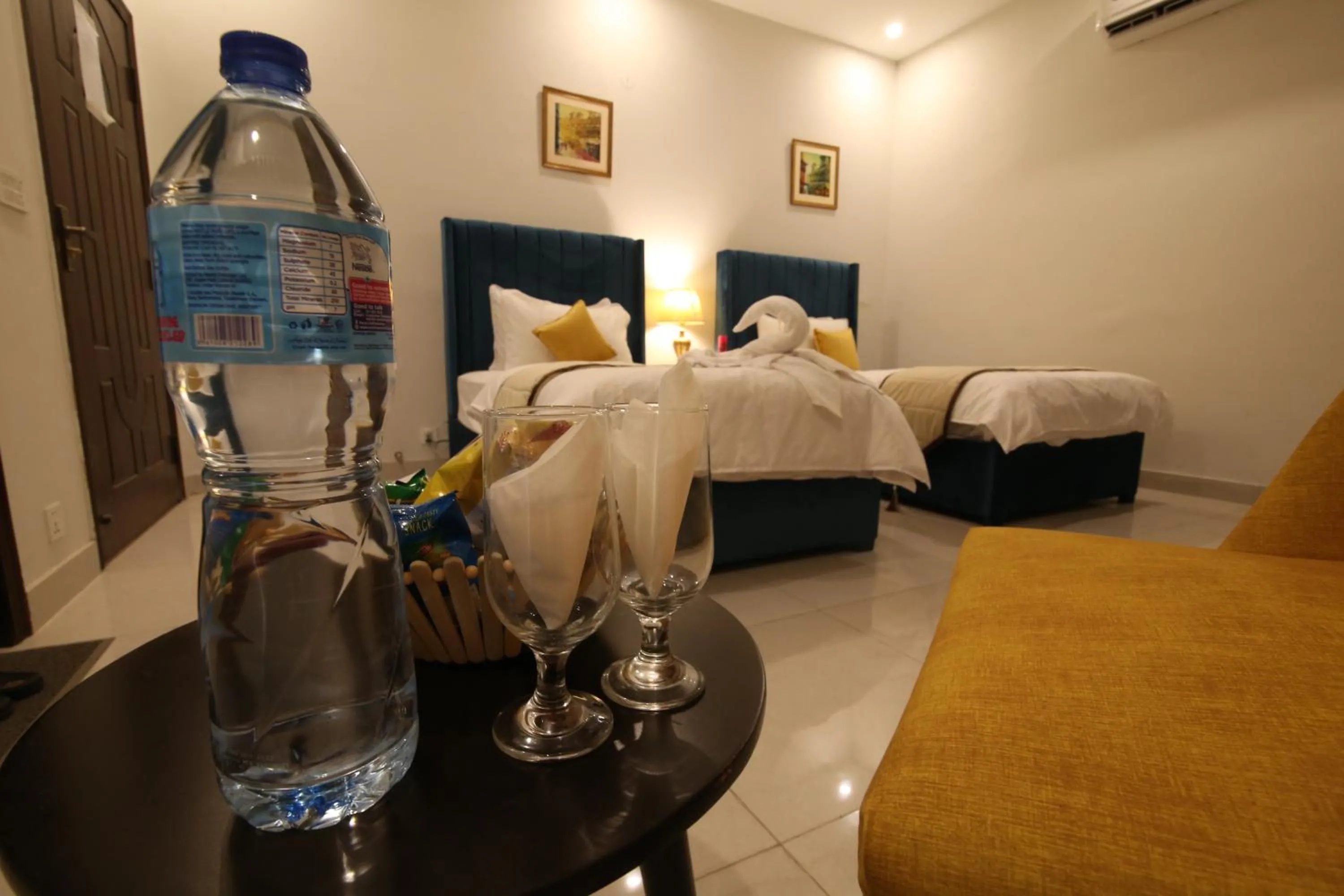 Bed in Cuzzy Inn Hotel