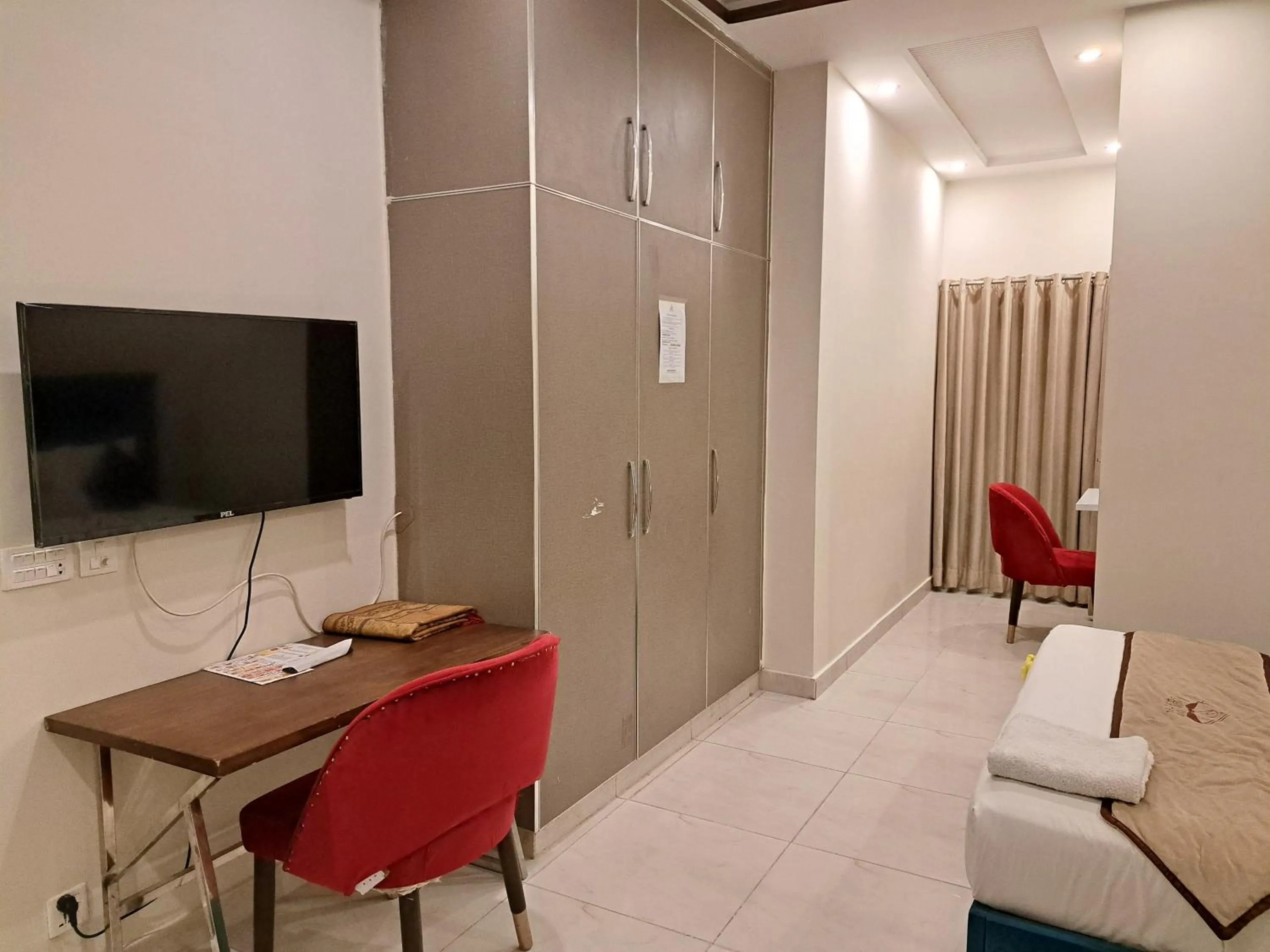 Bed in Cuzzy Inn Hotel