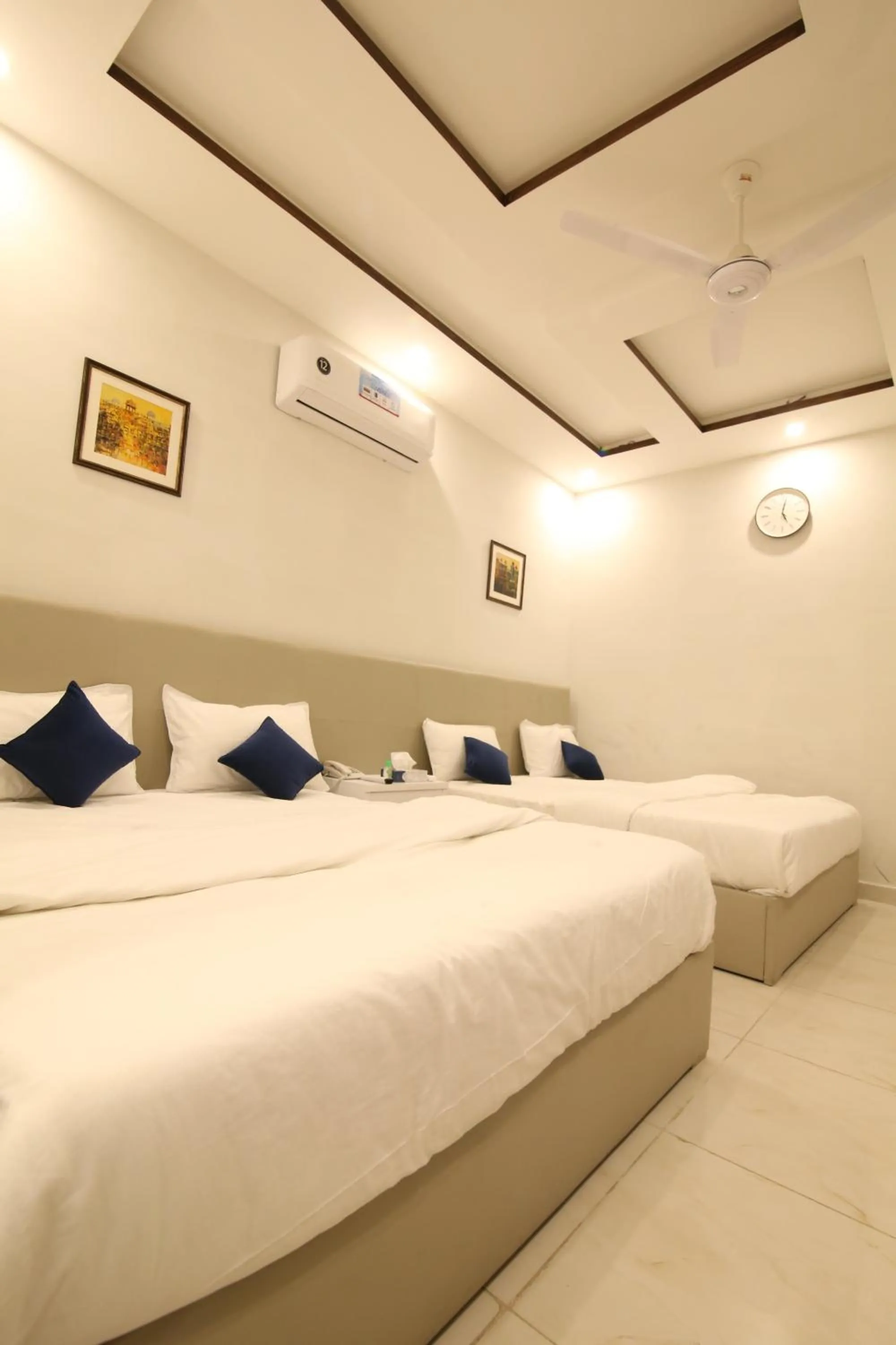 Bed in Cuzzy Inn Hotel