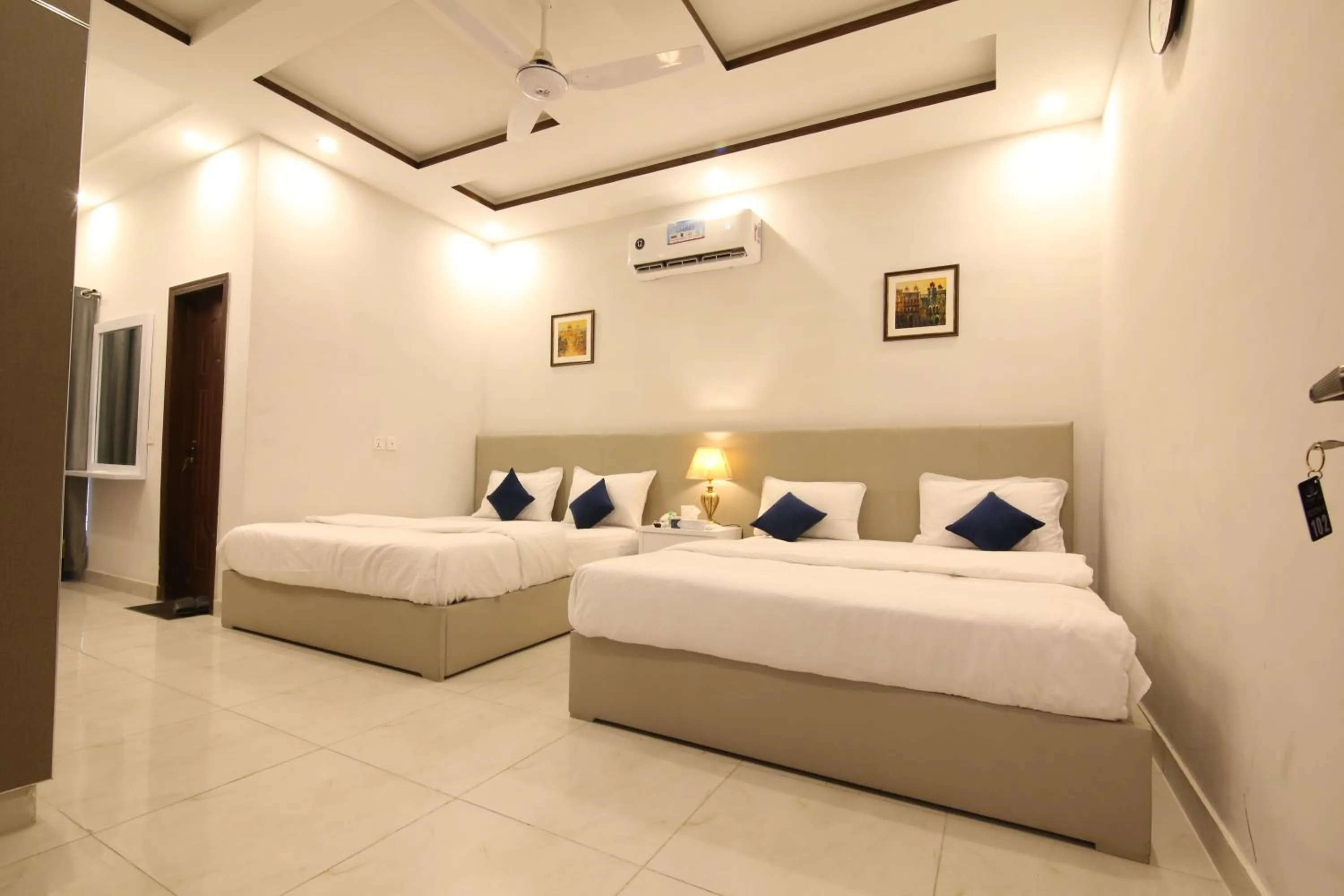 Bed in Cuzzy Inn Hotel