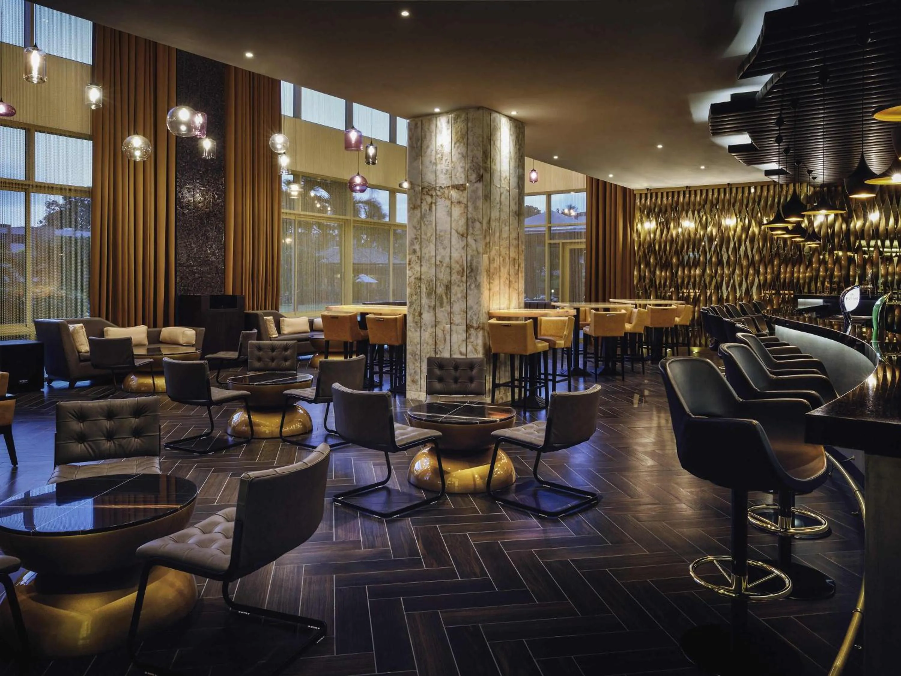 Lounge or bar in Mövenpick Ambassador Hotel Accra