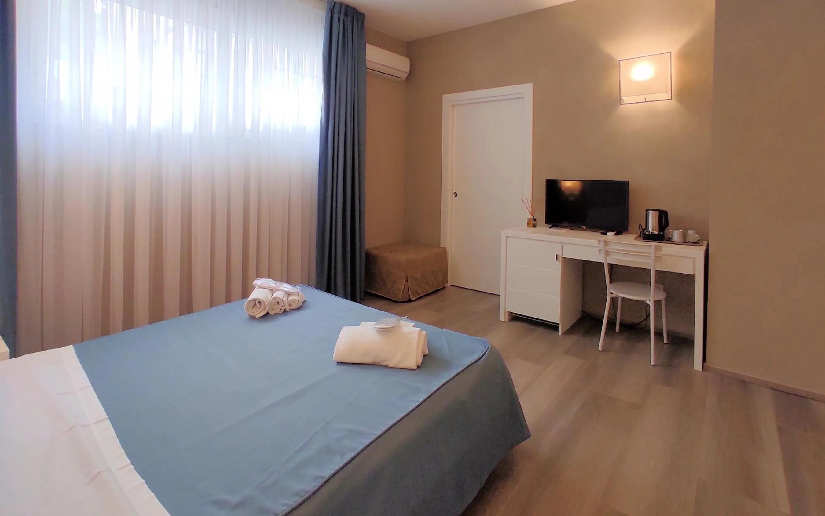 Bed in Hotel Cecina Beach
