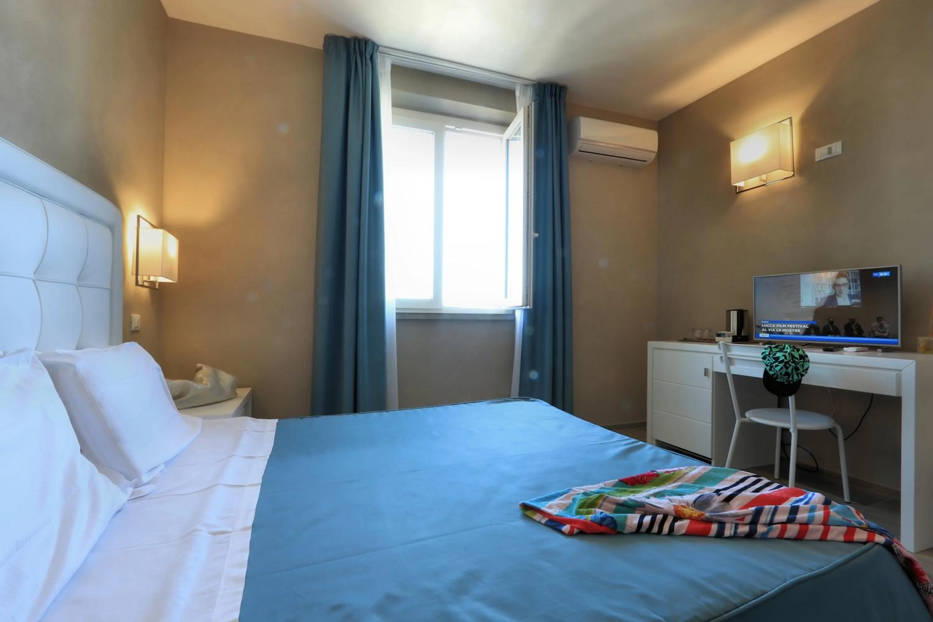 Bed in Hotel Cecina Beach