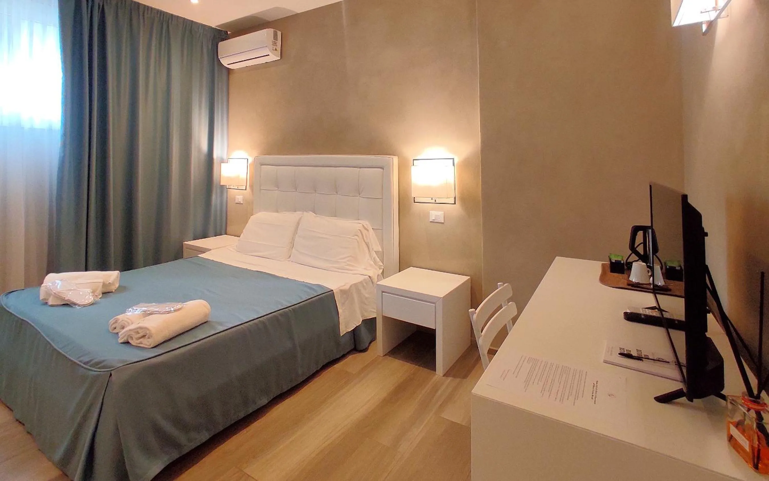 Bed in Hotel Cecina Beach