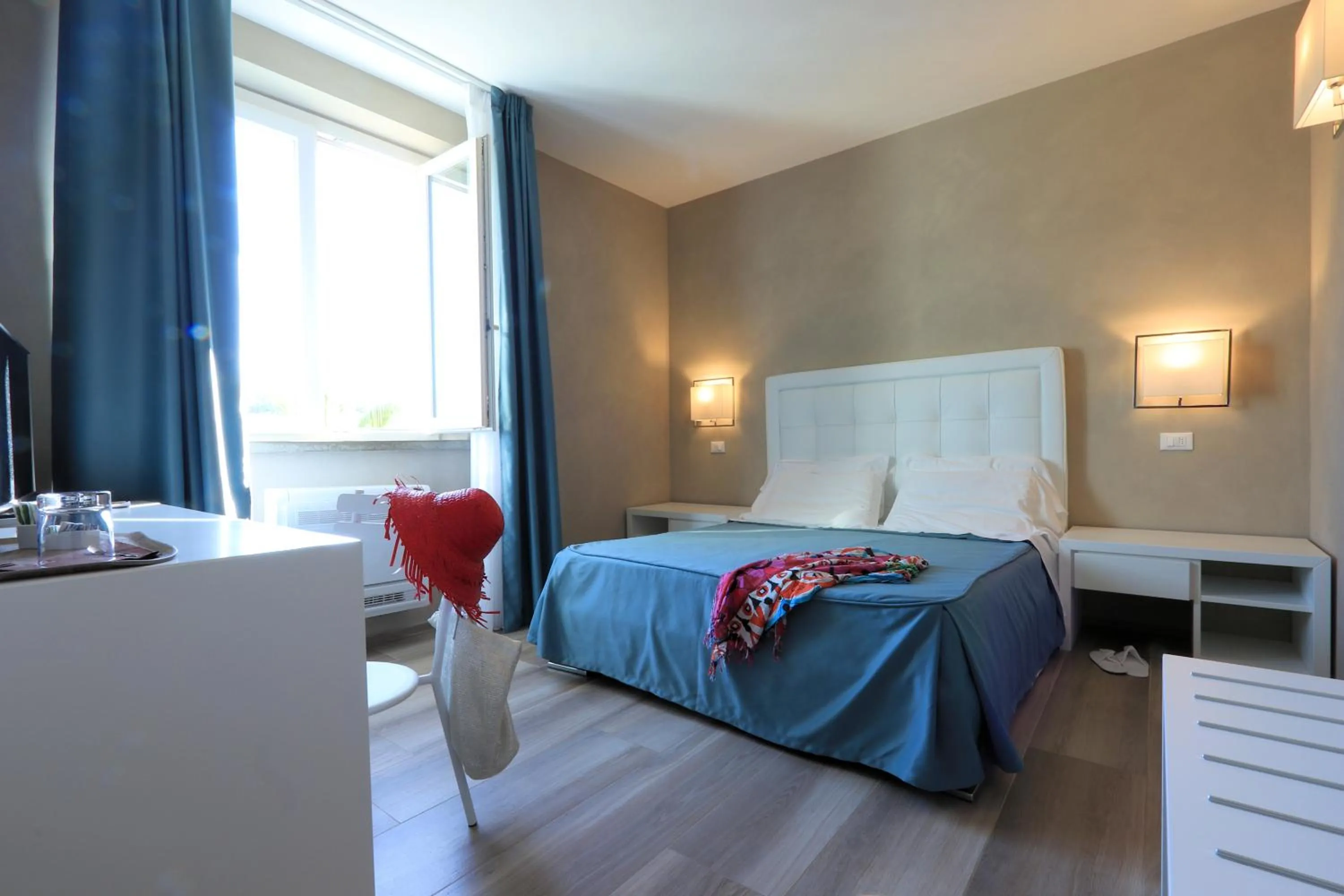 Bed in Hotel Cecina Beach